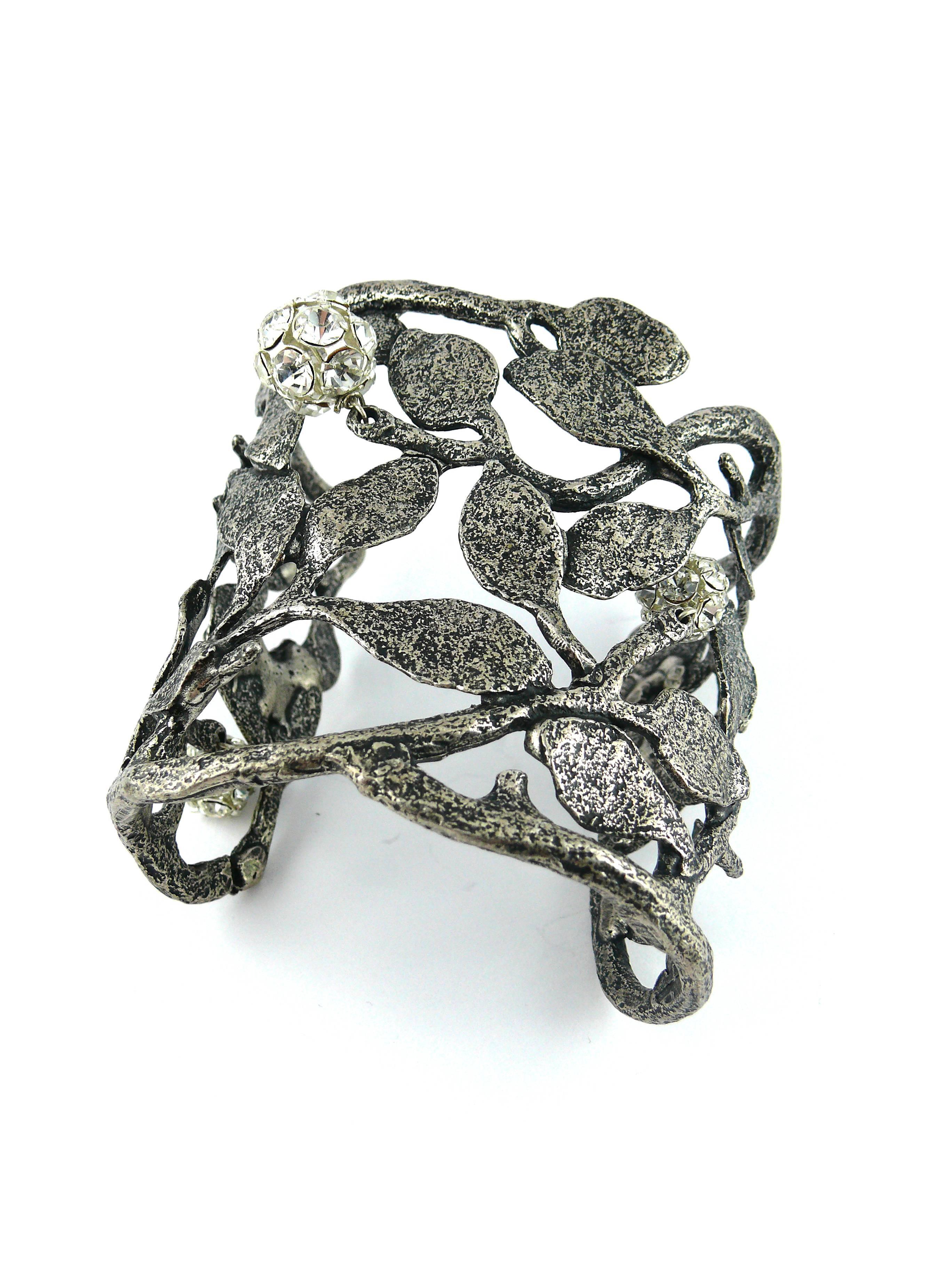 PATRICK RETIF (1958-1991) vintage rare silver tone with antique patina openwork cuff bracelet featuring a sculptural foliage design embellished with 3 crystal balls.

Superb quality for this stunning bracelet created by French artist PATRICK