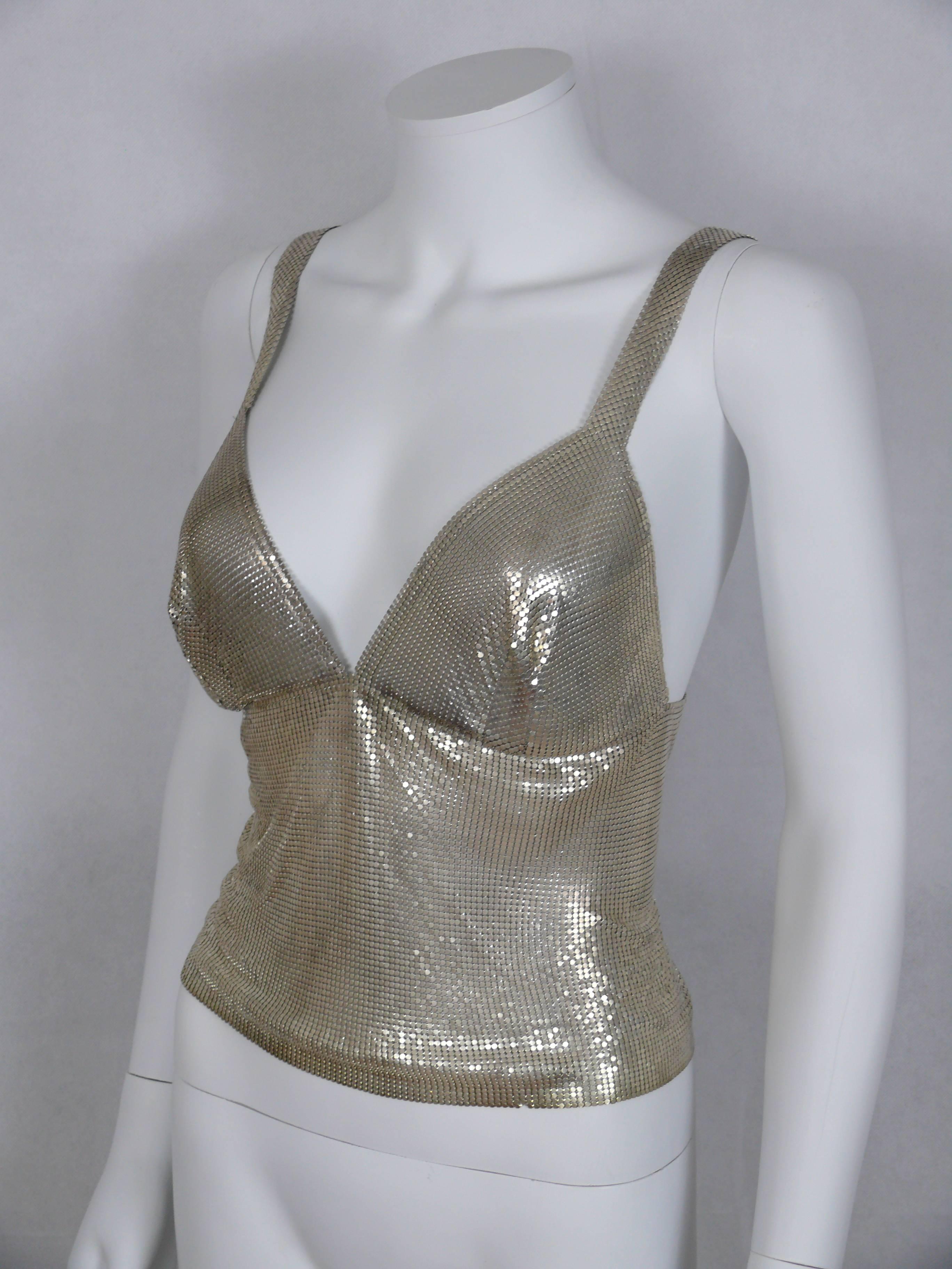 PACO RABANNE silver metal mesh tank top.

Rectangular metal label reads PACO RABANNE.

Indicative measurements taken laid flat : length approx 47 cm (18.50 inches).
Photographed on a 36 size mannequin.

Has some weight on it !

FINAL