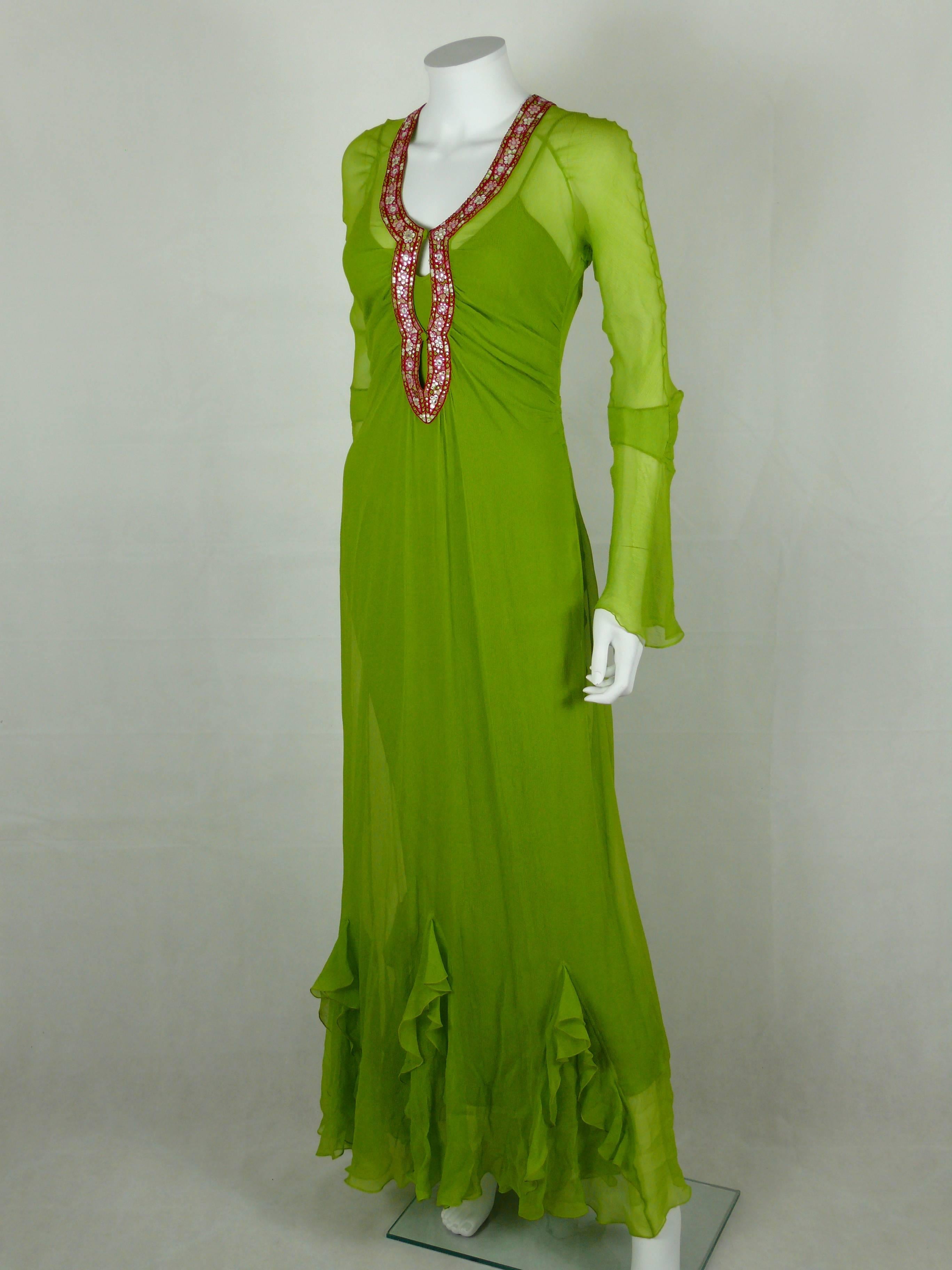 CHRISTIAN DIOR embroidered silk chiffon dress.

This dress is made of green silk chiffon embroidered with an oriental inspired design of stylized flowers with glass pellet embellishement

Silk lining (full length slip).

Beautiful contrast stitching