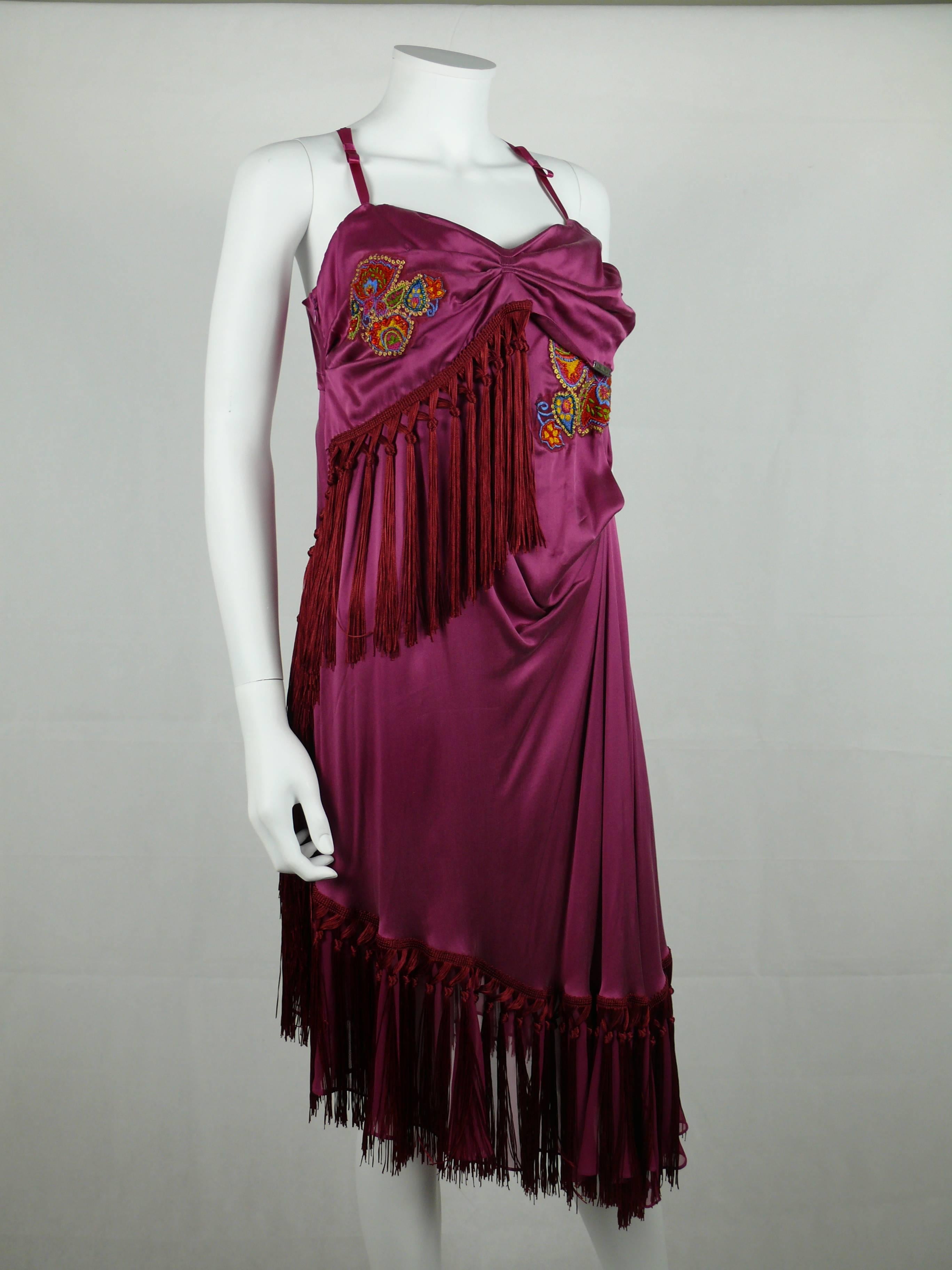JOHN GALLIANO gorgeous bias cut silk cocktail dress with colorful embroideries, embellishement and fringes.

Label reads GALLIANO.

Size tag reads : 30/44 (corresponds to a M size - US 8 - UK 12).
Please refer to measurements.

Composition label