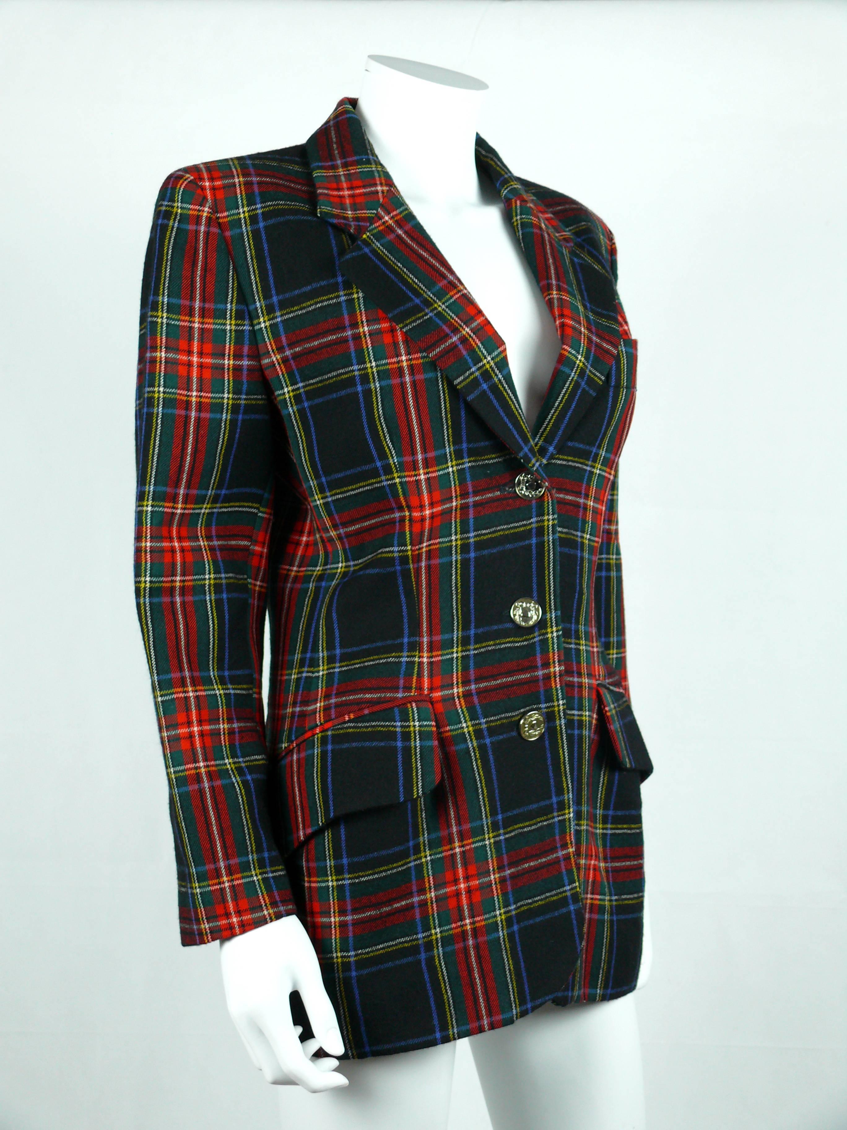 MOSCHINO vintage iconic wool tartan plaid blazer from the 1990s.

Two front pockets.
Button closure.
Fully lined.
Gorgeous fitted cut.

Label reads CHEAP AND CHIC by MOSCHINO Made in Italy.

Color : red / green / blue / yellow /
