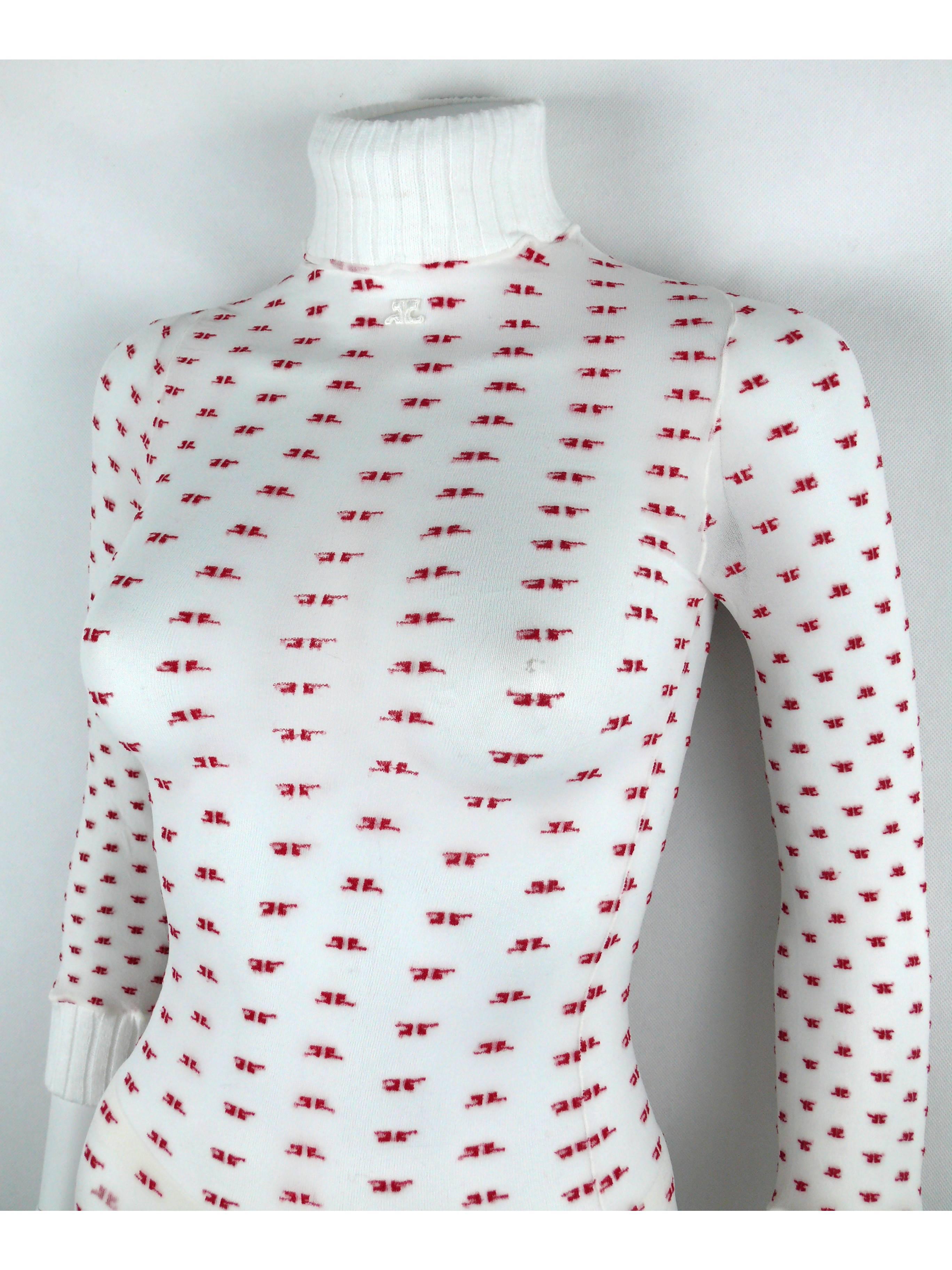 COURREGES vintage rare white sheer and red monogram set.

The set includes a turtle neck half sleeve top and matching tights.
Embroidered COURREGES logo at the front top.

Unused condition with original packaging (used).

Label reads