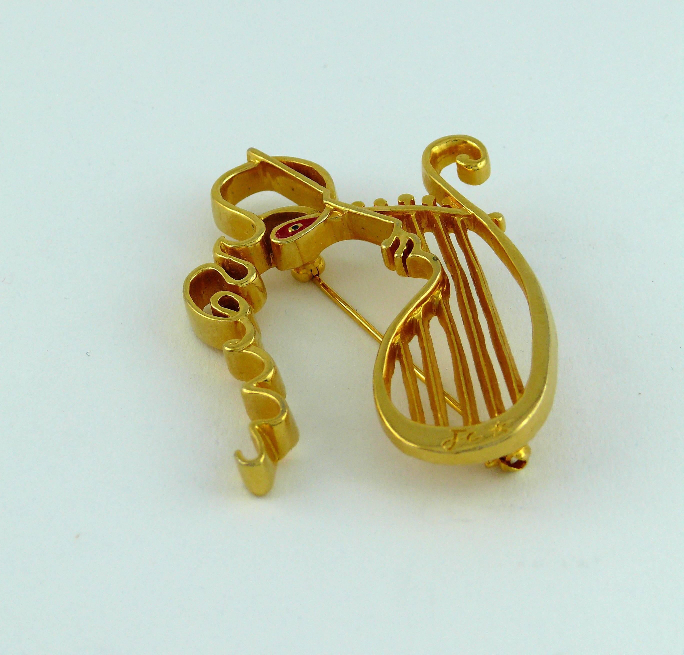 Broche Orphée JEAN COCTEAU en or et émail. 

Gaufré 2001 Comité Jean Cocteau A. Madeline Flammarion. 

Note
En tant qu'acheteur:: vous êtes entièrement responsable des droits de douane:: des autres taxes locales et de toute procédure administrative