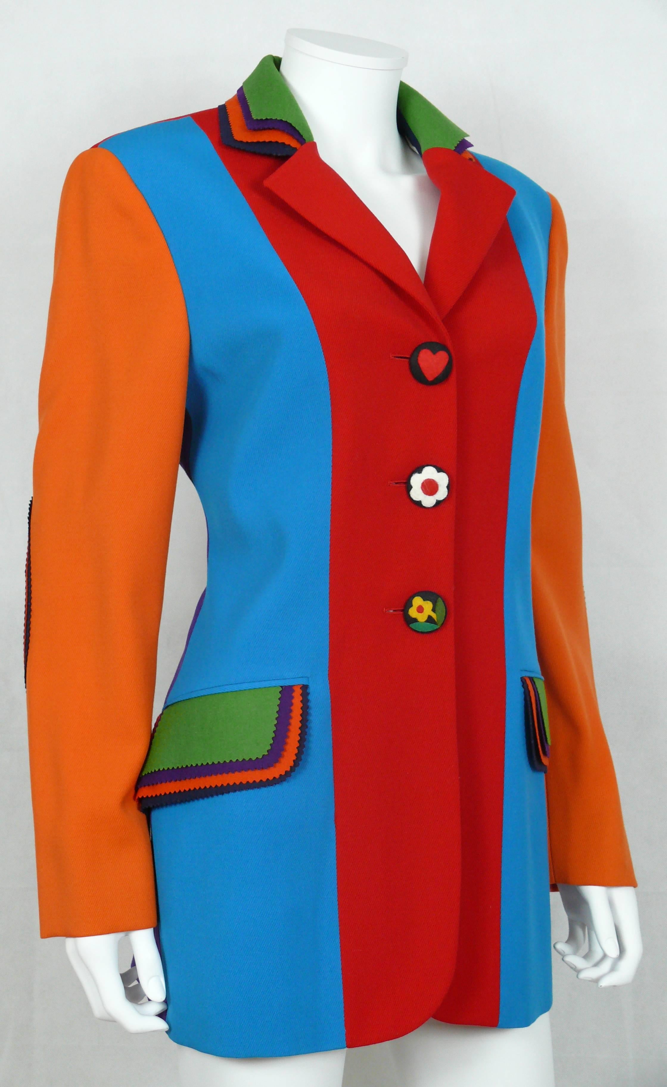 MOSCHINO vintage color blocked wool jacket.

Front floral and heart felter buttons.
Multicolored felter side pockets and collar.

Fitted cut.

Fully lined.

Label reads CHEAP AND CHIC by MOSCHINO Made in Italy.

Marked Size : I 44 / D 40 / F 40 / GB