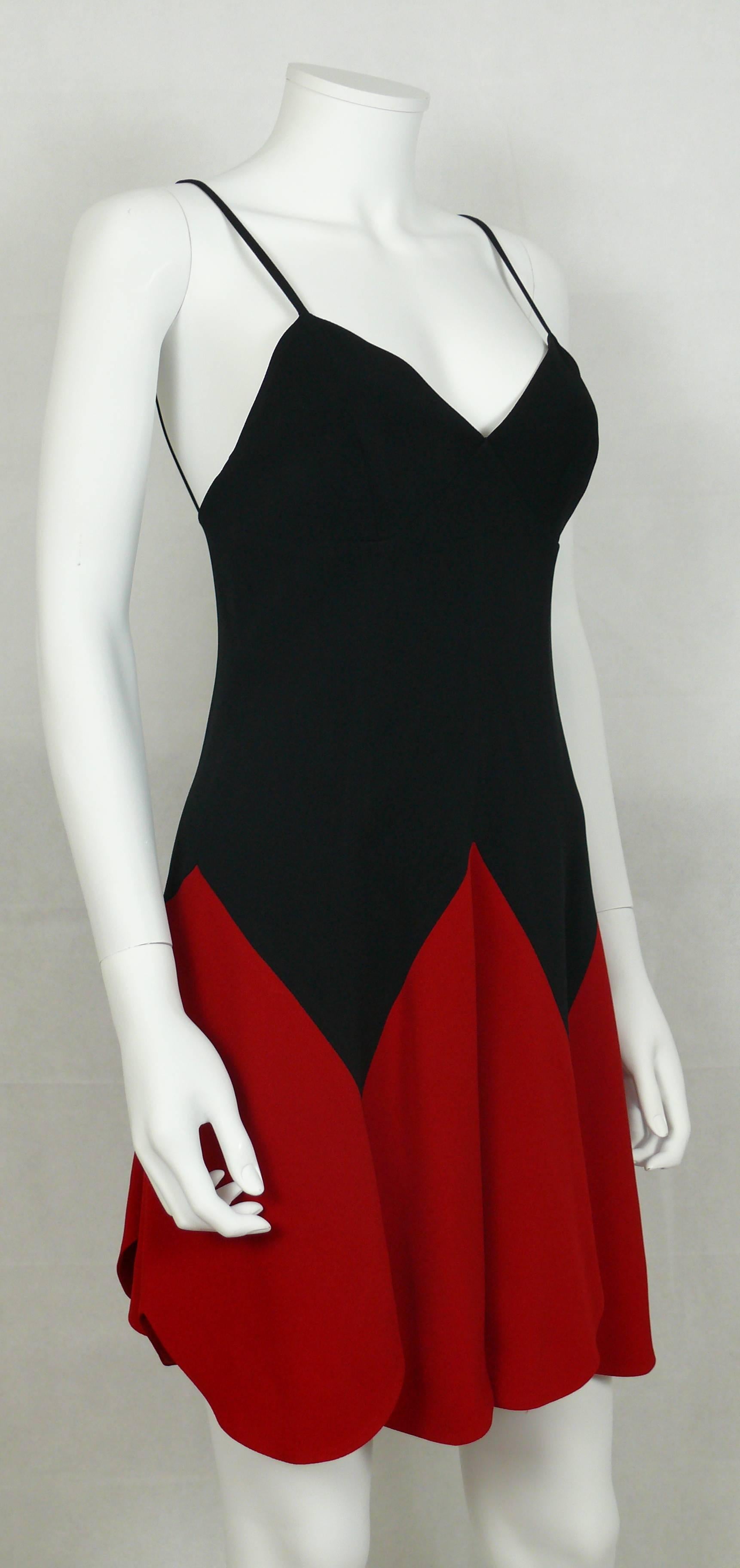 MOSCHINO 1990s vintage iconic heart mini dress.

Fitted cut.

Spaghetti straps.

Side zip closure.

Label reads CHEAP AND CHIC by MOSCHINO Made in Italy. 

Marked Size : I 42 / D 38 / F 38 / GB 10 / USA 8.
Please double check