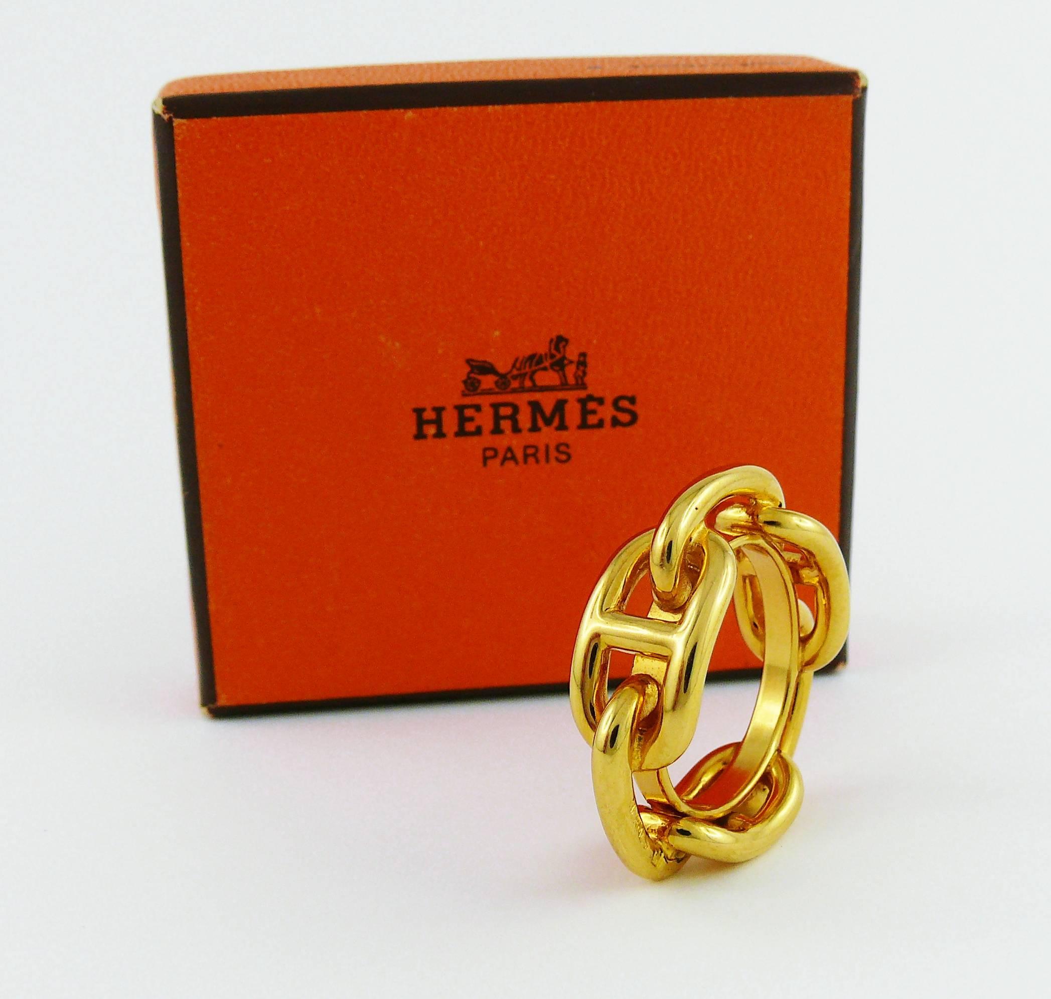 HERMES gold toned Chaine d'Ancre scarf ring.

Embossed HERMES.

Indicative measurements : total diameter approx. 2.9 cm (1.14 inches) / inside circumference approx. 6.30 cm (2.48 inches).

Comes with original box.

JEWELRY CONDITION CHART
-
