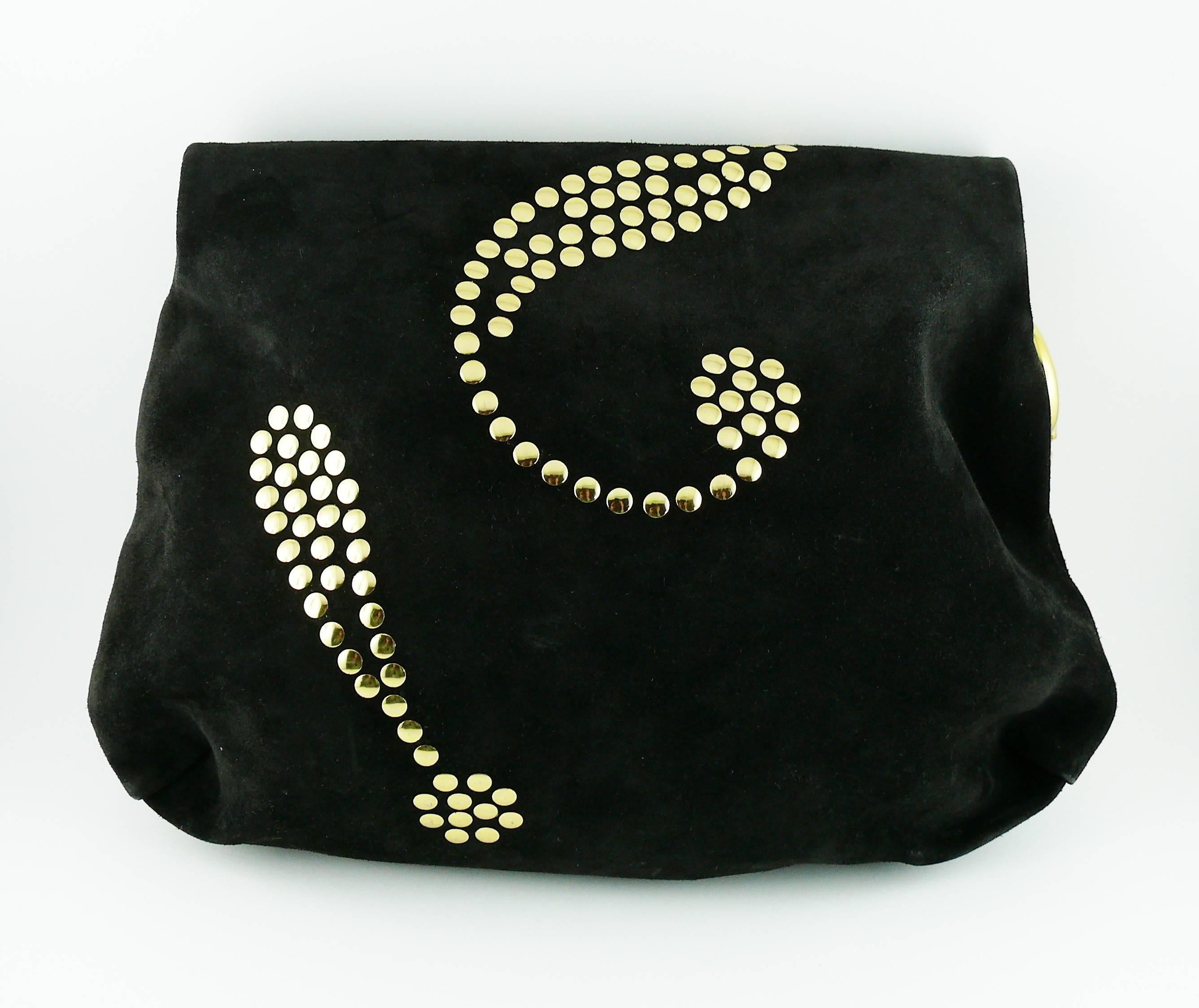 MOSCHINO vintage black studded suede clutch featuring four iconic symbols (heart, question mark, exclamation mark, peace) and signature name.

Gold toned chain.

Zip closure.

Embossed MOSCHINO by REDWALL on the ring.
Stamped on the lining MOSCHINO