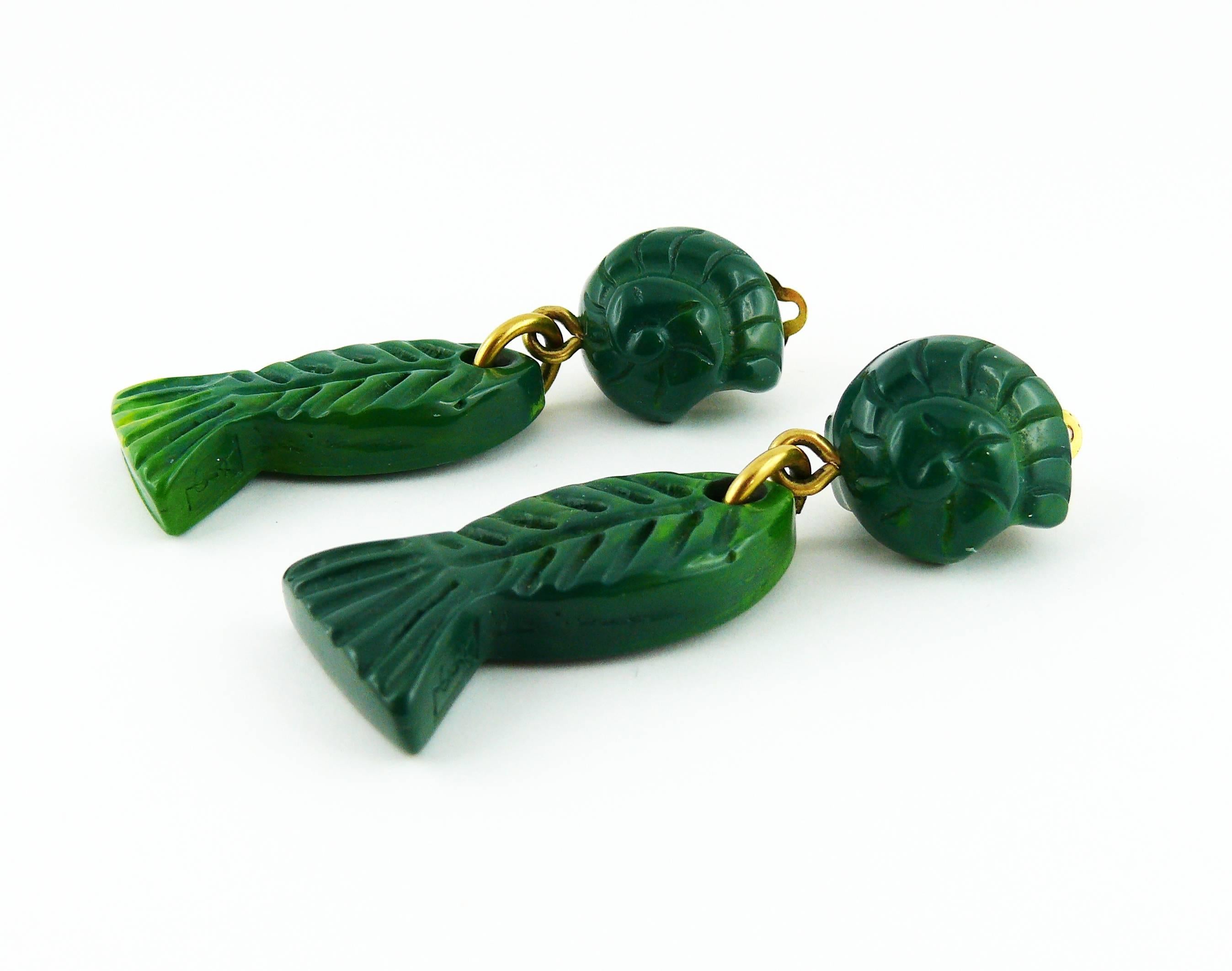 YVES SAINT LAURENT vintage sea life dangling earrings (clip-on) featuring green carved resin fish and shell.

Embossed YSL.

JEWELRY CONDITION CHART
- New or never worn : item is in pristine condition with no noticeable imperfections
-
