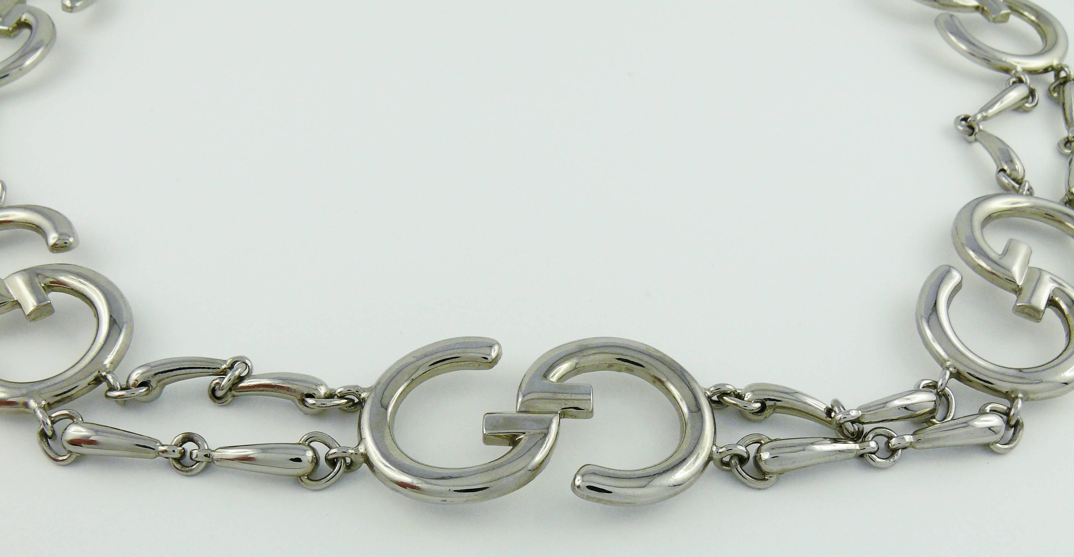 GUCCI vintage 1970s silver toned iconic belt featuring Guccio Gucci GG initials and horsbit links.

Secure clasp system topped with G initial.

Embossed GUCCI an GUCCI Italy.

Indicative measurements : length approx. 73 cm - 74 cm (28.74 inches -