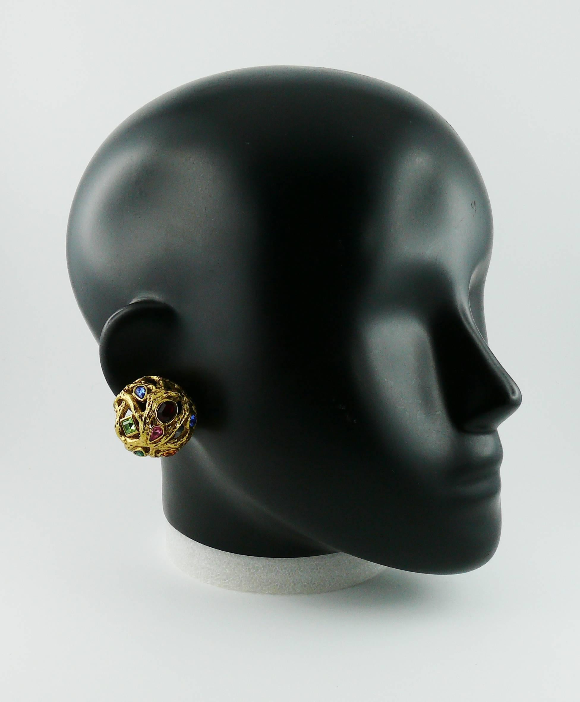 YVES SAINT LAURENT vintage gold tone domed clip-on earrings with mulicolored crystal embellishement.

These earrings feature a gorgeous openwork "branch" design.

Marked YSL Made in France.

JEWELRY CONDITION CHART
- New or never worn :