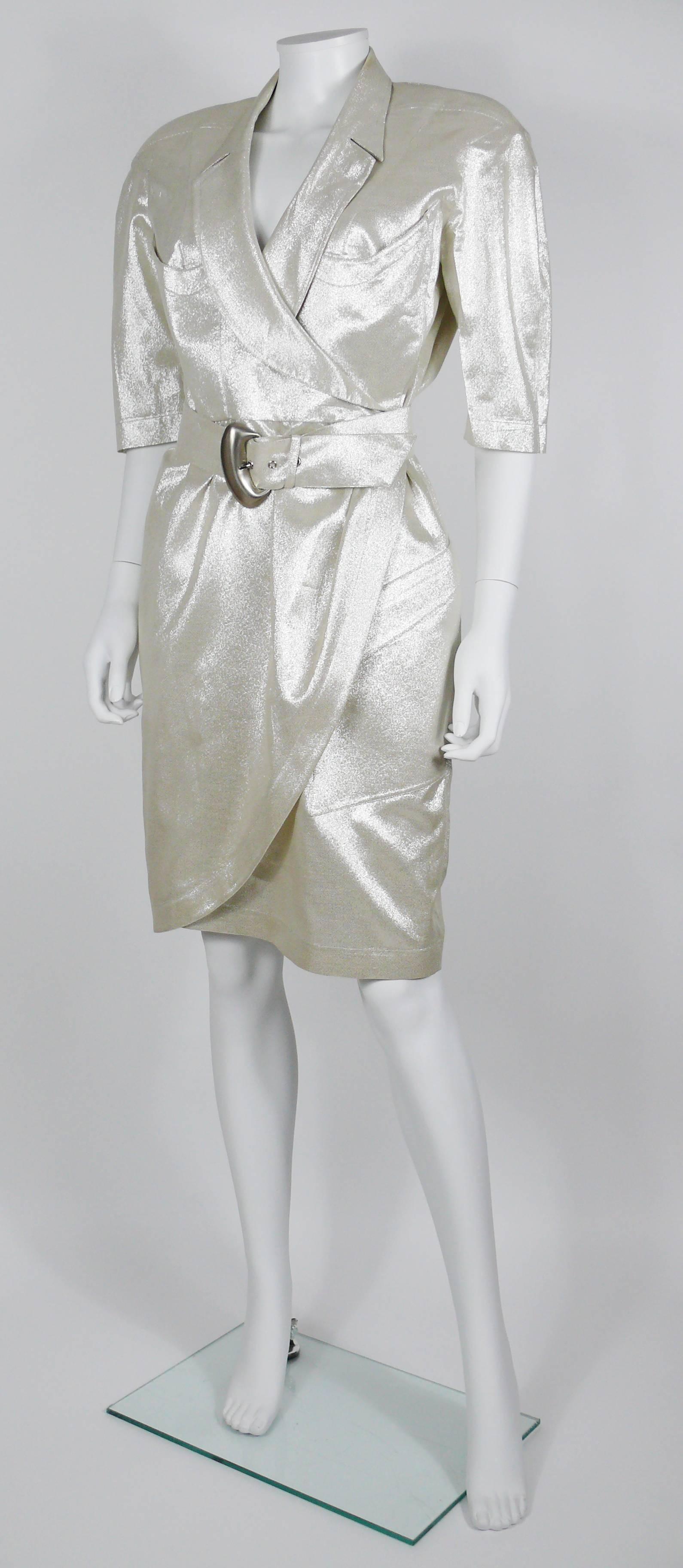 THIERRY MUGLER vintage gold lurex belted wrap dress.

Gorgeous MUGLER's cut.

Half length sleeves.
Unlined.
Shoulder pads (stitched - but can be removed).
Two pockets at the front top.
One asymetric pocket at the front lower.

Label reads THIERRY