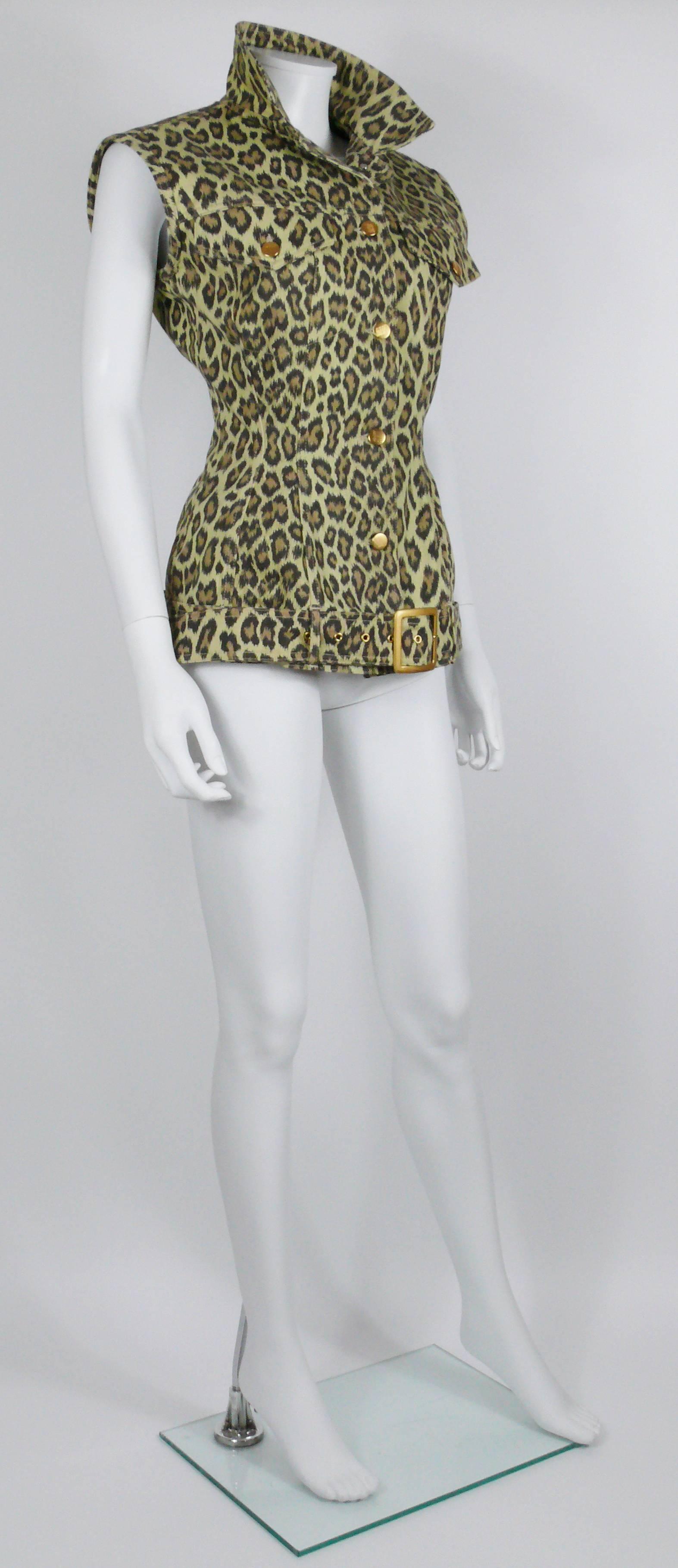 JEAN PAUL GAULTIER vintage cheetah print denim corset jacket.

Front buttoning.
Two pockets at the front.
Corset cut design.
Removable belt featuring matte gold tone buckle.

Label reads JUNIOR GAULTIER Made in Italy.

Composition label reads : 100