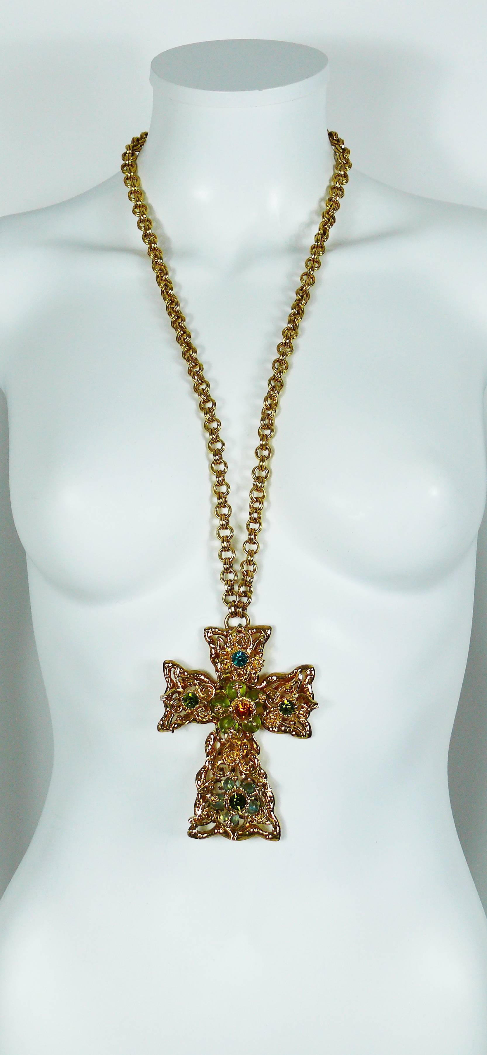 CHRISTIAN LACROIX vintage rare massive openwork gold tone cross pendant necklace with multi colored crystal embellishement.

Chunky gold tone chain.
Hook clasp.

Marked CHRISTIAN LACROIX CL Made in France.

Indicative measurements : total length