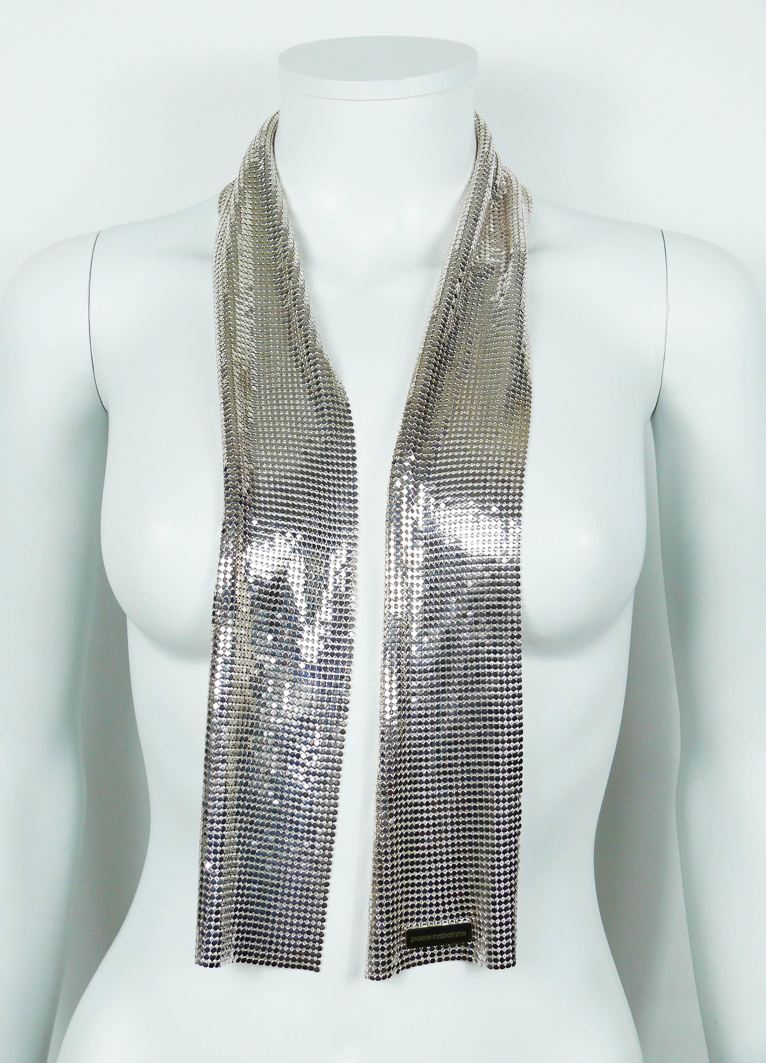PACO RABANNE vintage silver mesh jersey scarf.

VIP gift.

Marked PACO RABANNE.

Indicative mesaurements : length approx. 102 cm (40.16 inches) / width approx. 8 cm (3.15 inches).

Comes with original box (used).

JEWELRY CONDITION CHART
- New or