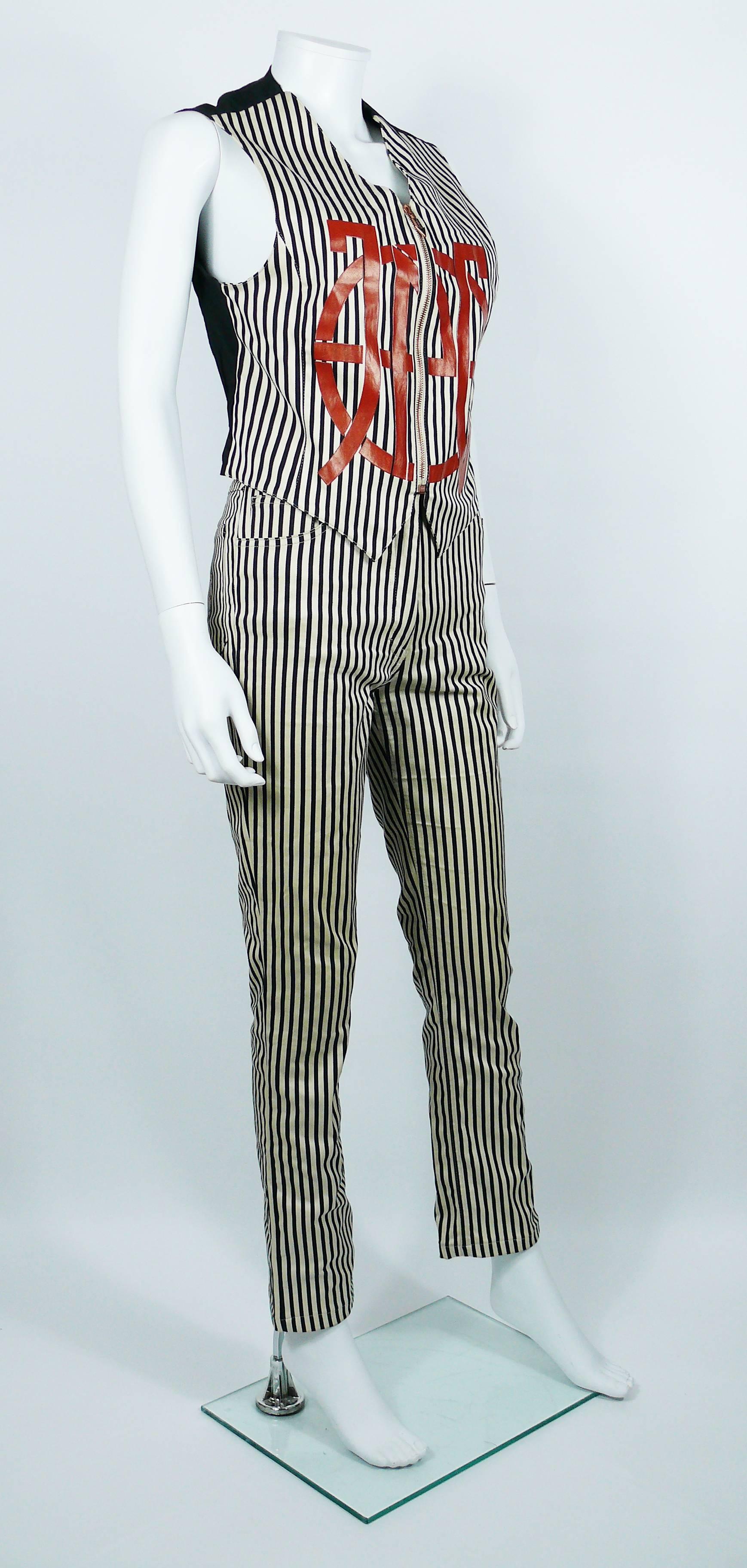 JEAN PAUL GAULTIER vintage 1990s vest and trouser set featuring a black striped design with a large red flocked JPG logo on the vest front.

VEST features :
- Front zippered closure with enameled JPG signature holder.
- Large red flocked JPG logo on