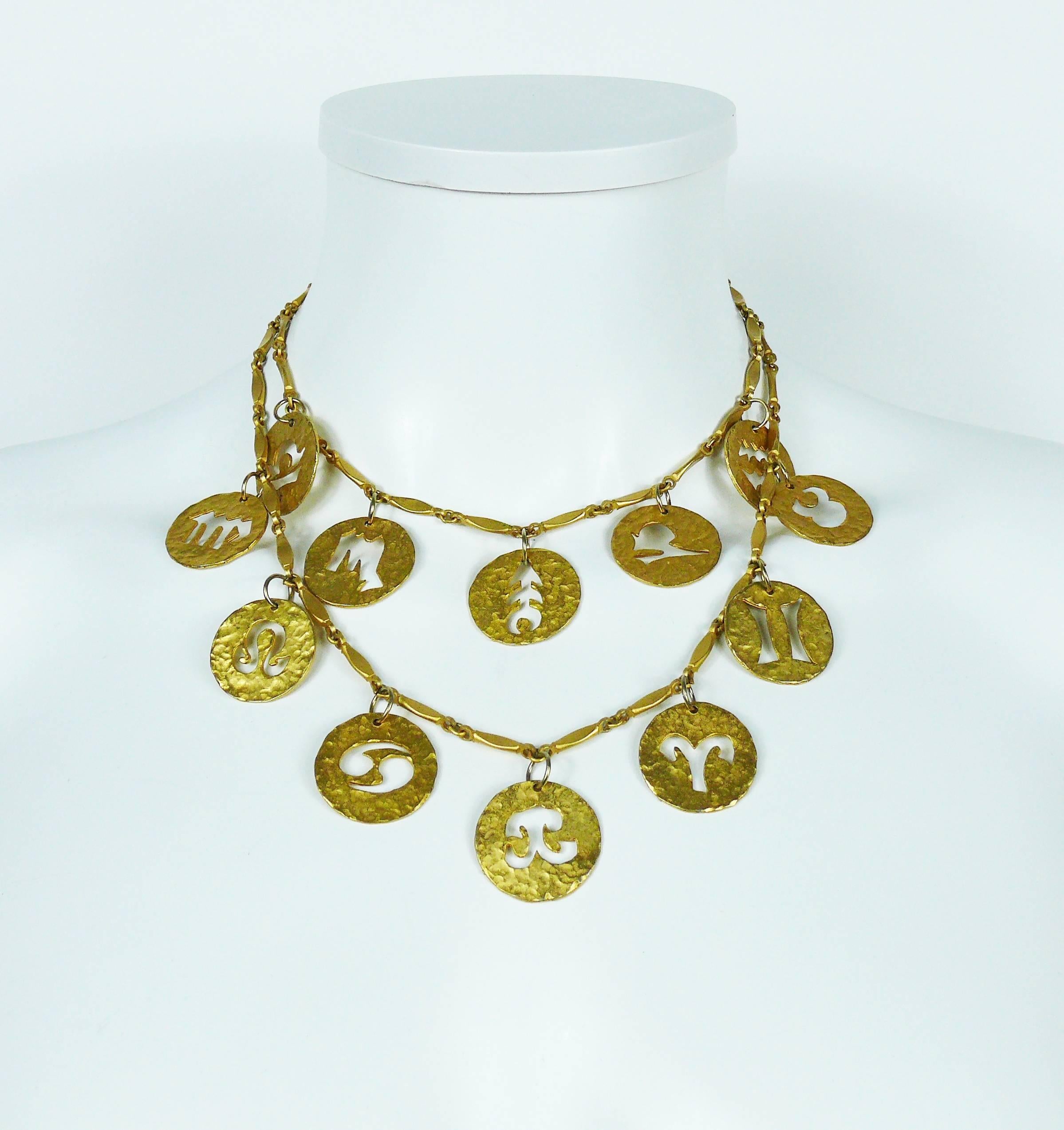 PACO RABANNE vintage matte gold toned double strand necklace featuring the 12 zodiac signs.

Created in the ateliers of Maison DESRUES in the 1990s.

Lobster clasp closure.

Marked PACO RABANNE Paris.

Indicative measurements : length approx. 37.5