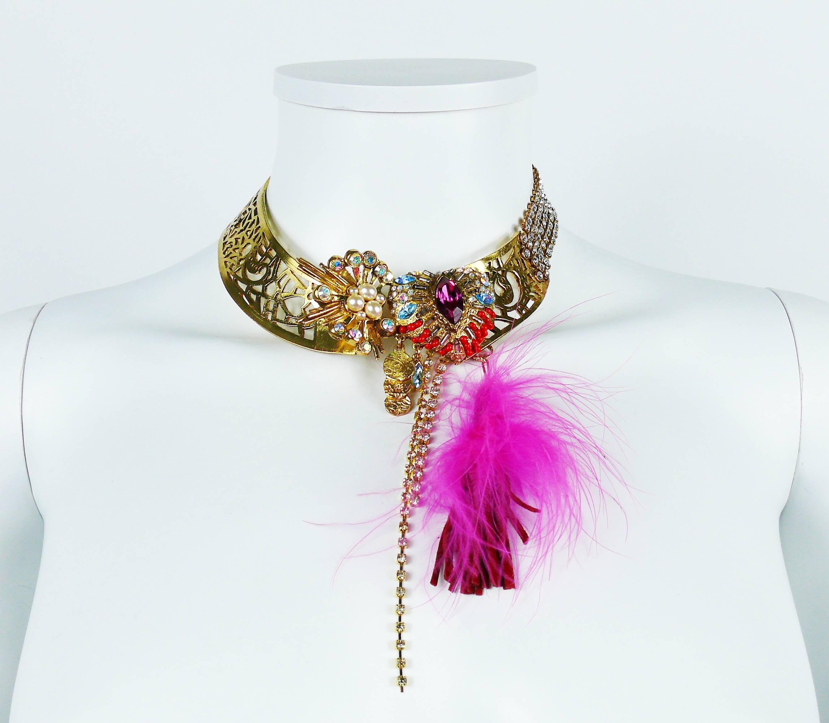 CHRISTIAN LACROIX vintage opulent jewelled gold tone choker necklace featuring multicolored SWAROVSKI crystals, faux pearls, faux coral beads and a suede tassel charm with feathers.

Marked CHRISTIAN LACROIX CL Made in France.

JEWELRY CONDITION