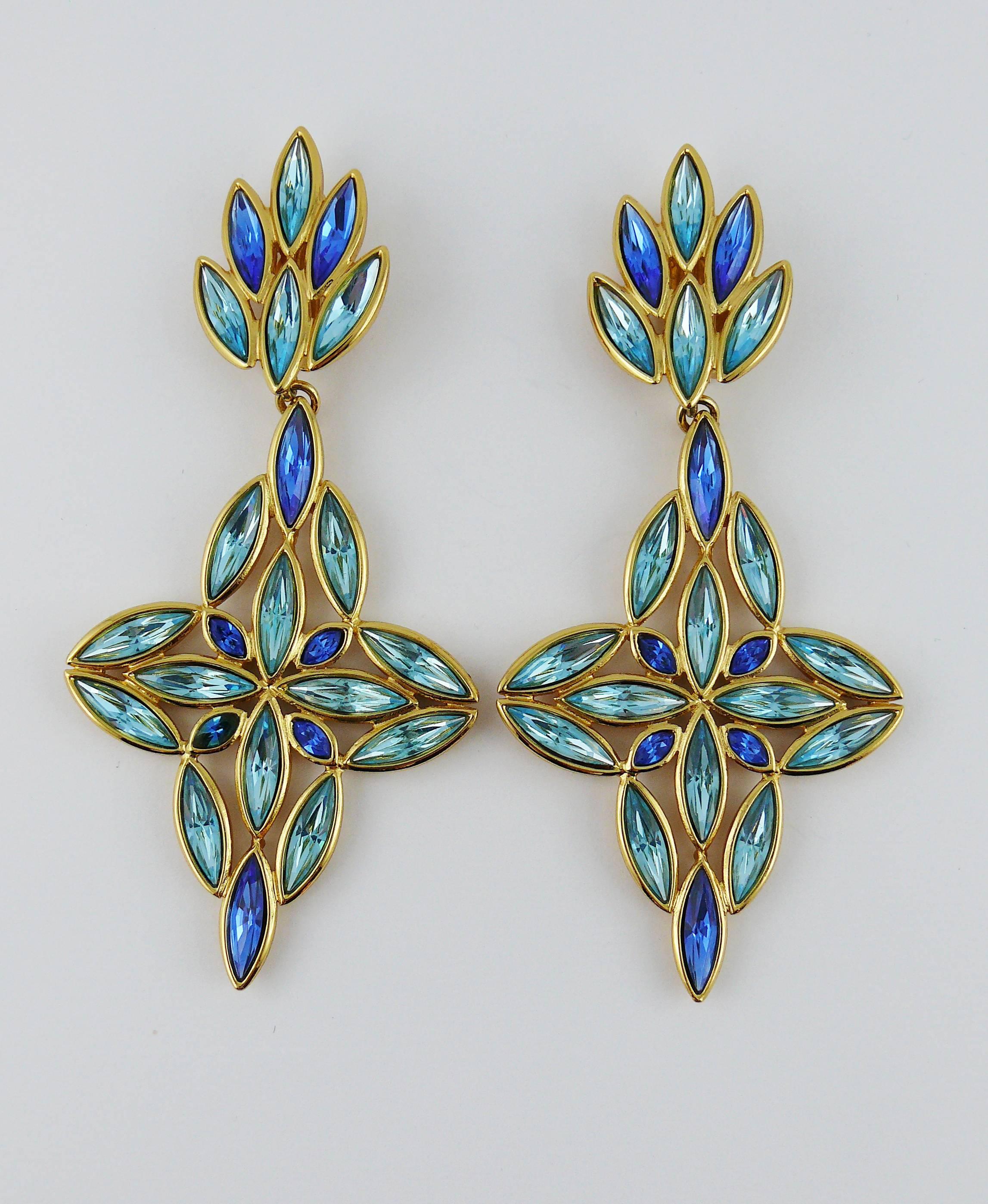 YVES SAINT LAURENT vintage massive dangling earrings (clip-on) featuring blue shade crystals in a gold toned setting.

Embossed YSL Made in France.

Indicative measurements : length approx. 11 cm (4.33 inches) / max. width approx. 5 cm (1.97