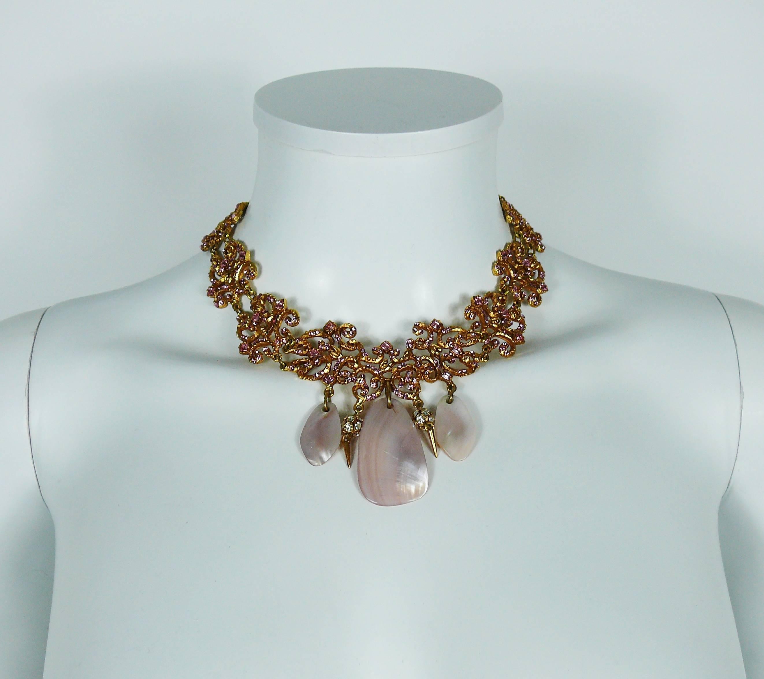 CHRISTIAN LACROIX gorgeous vintage gold toned necklace featuring an openwork arabesque design embellished with pink crystals and mother of pearl charms.

T-bar closure.
Extension chain.

Marked CHRISTIAN LACROIX CL Made in France.

Indicative