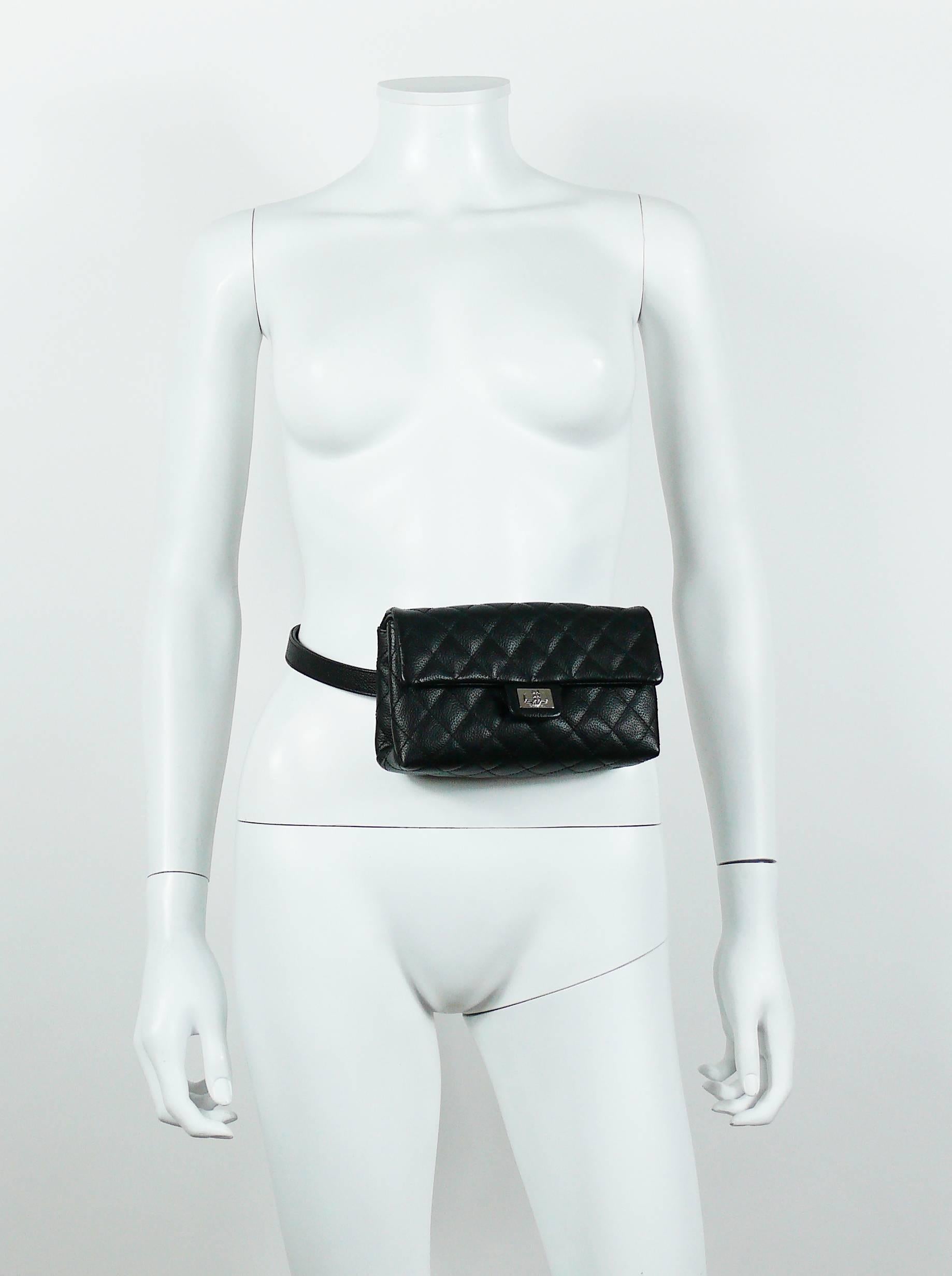 CHANEL UNIFORM black quilted grained leather waist-belt bag.

Please note this item was original part of a CHANEL uniform.

BAG features :
- Flap top with magnetic snap closure.
- Black textile lining
- One inner pocket.
- Silver toned