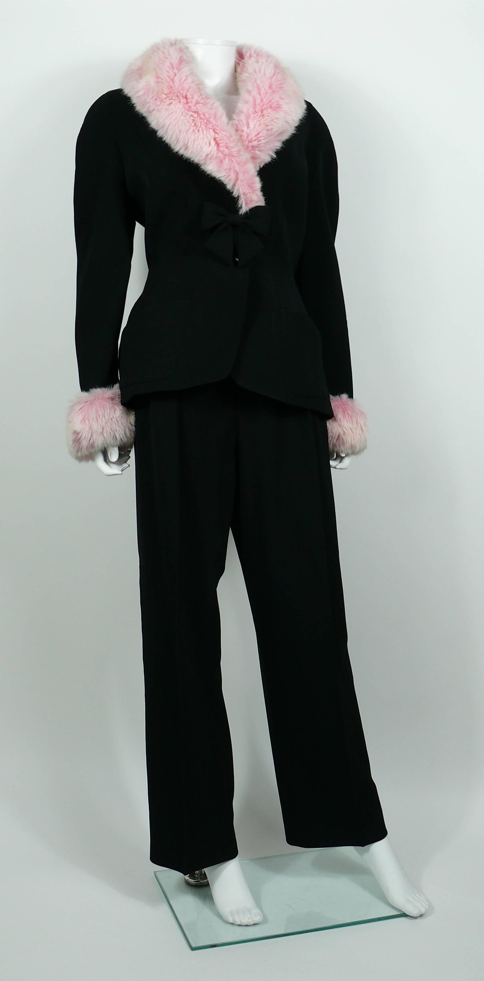 THIERRY MUGLER vintage black worsted wool pant suit featuring candy pink faux fur trim at the cuffs and around the collar.

BLAZER has a front hidden snap buttoning with a gorgeous bow detail, long sleeves, two pockets and fitted tailored