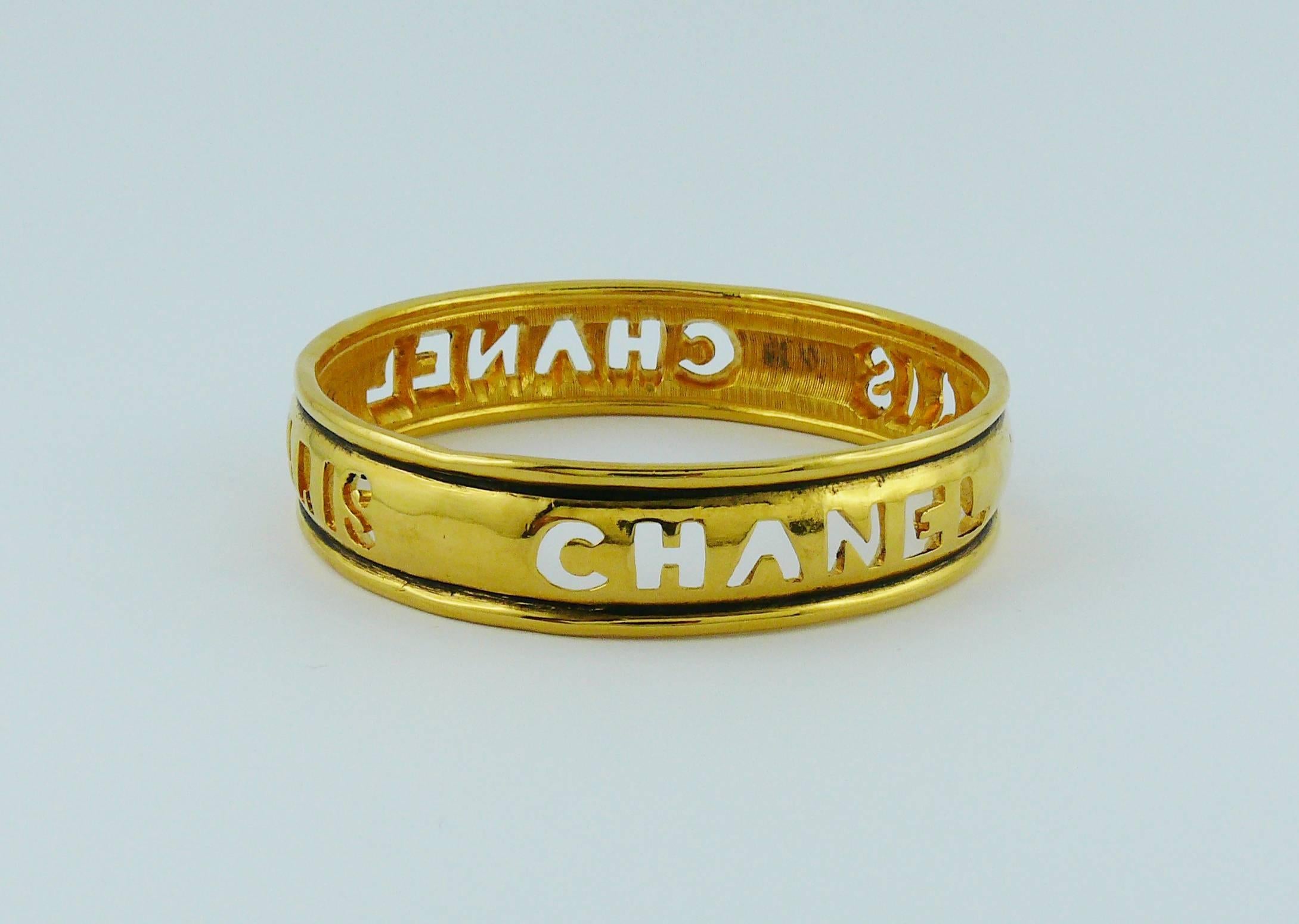 Women's Chanel Vintage 1980s Gold Toned Cut Out Bangle Bracelet  For Sale
