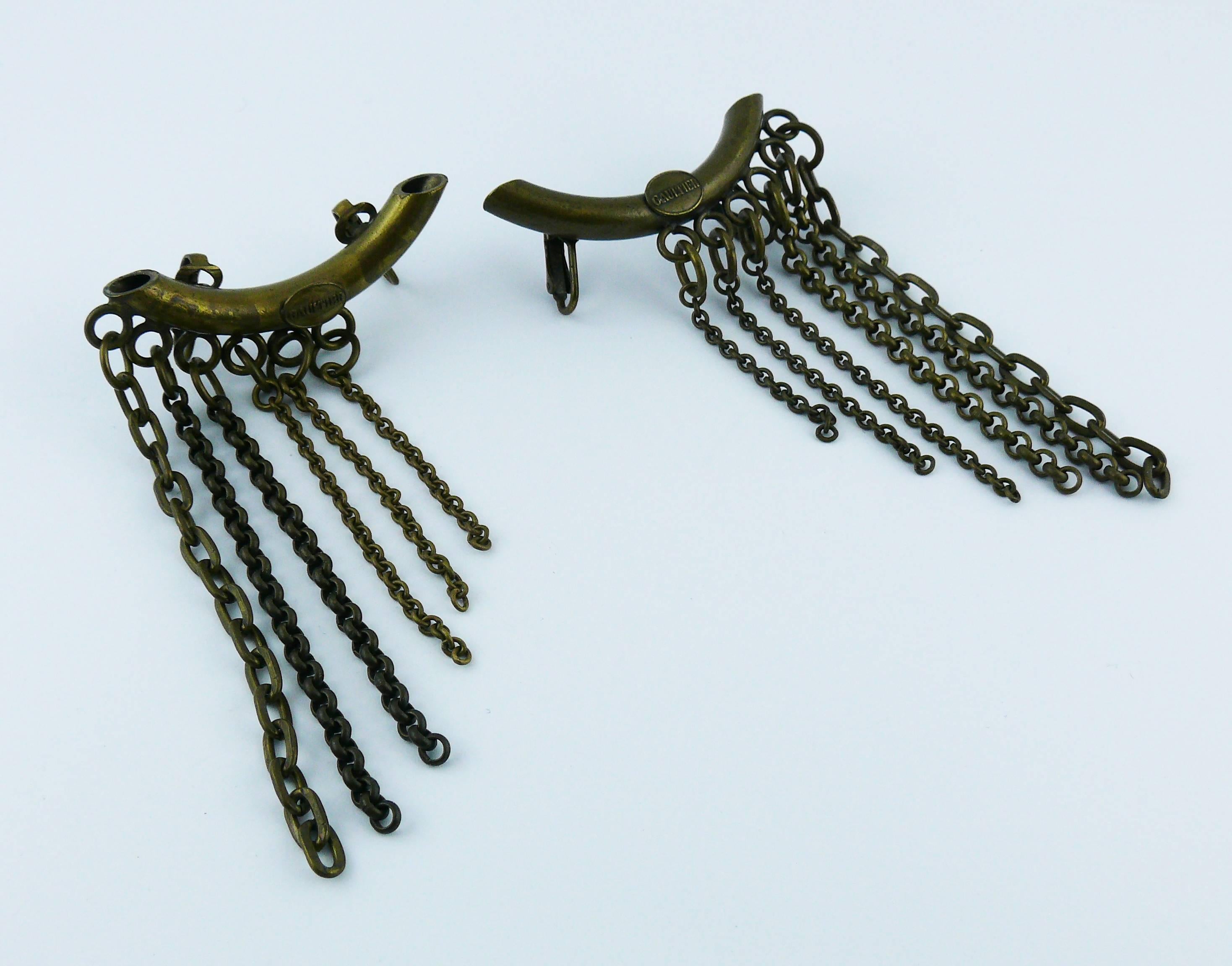 JEAN PAUL GAULTIER vintage rare antiqued bronze tone tubular ear cuffs embellished with chains.

Marked GAULTIER.

Indicative measurements : max. length approx. 9.4 cm (3.70 inches).

Comes with original dust bag (used condition).

JEWELRY CONDITION