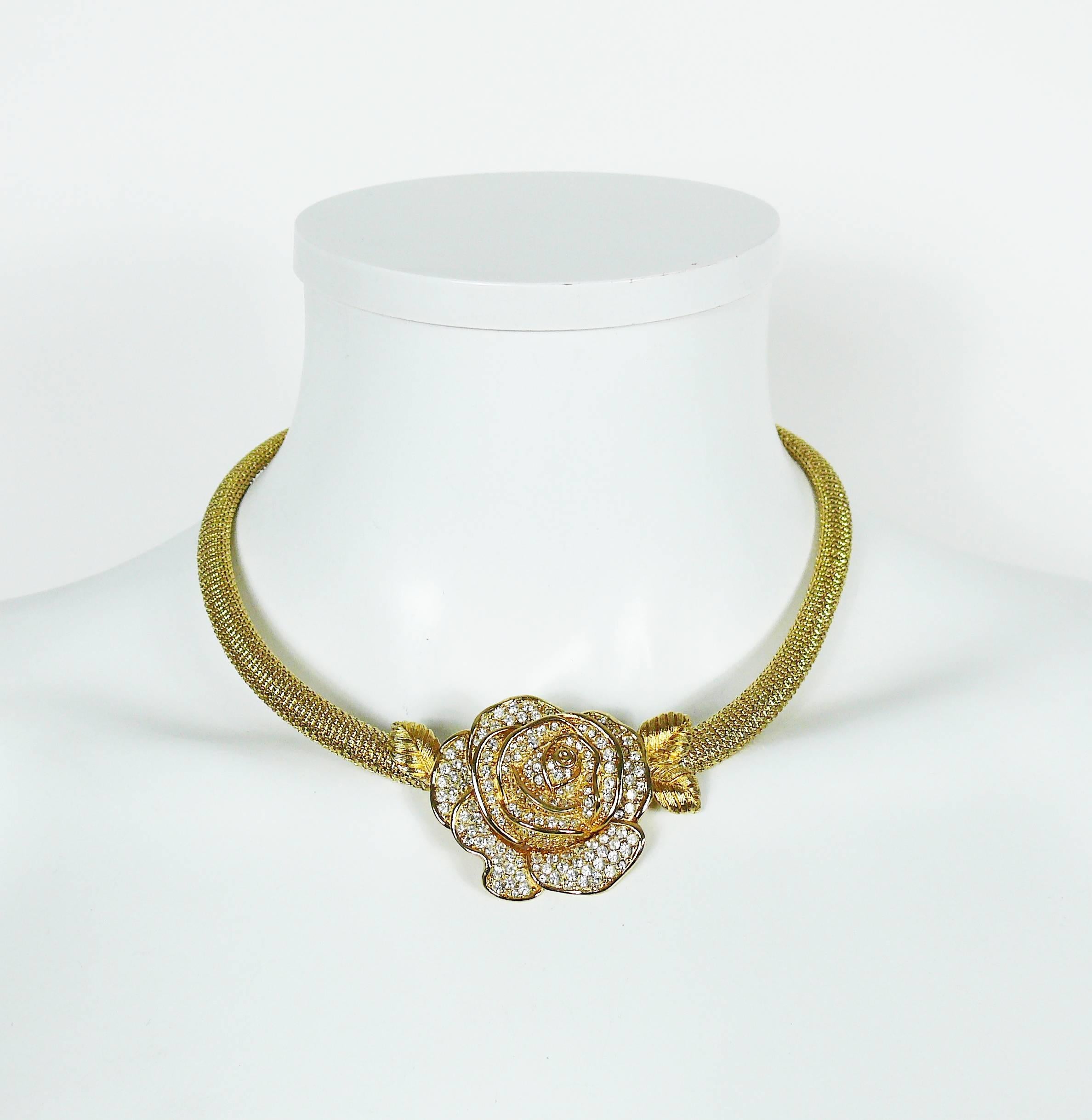 CHRISTIAN DIOR beautiful vintage gold toned collar necklace featuring CHRISTIAN DIOR's iconic rose detail with clear crystal embellishement.

Lobster clasp closure.
Extension chain.

Marked CHR. DIOR Germany.

Indicative measurements : max.