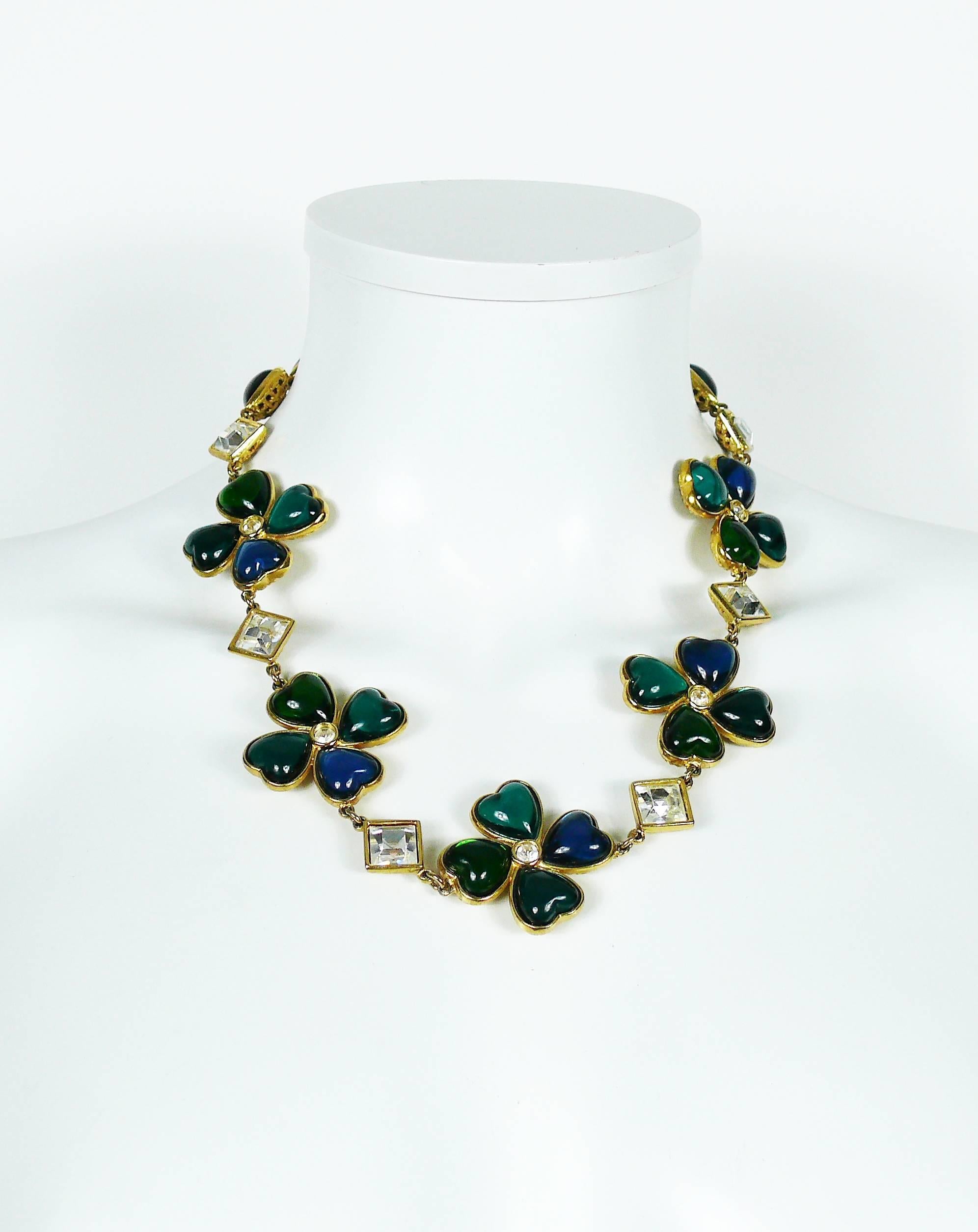 YVES SAINT LAURENT vintage rare gold toned necklace featuring green-blue resin clovers and hearts with clear crystal embellishement.

Love clasp and T-bar closure.

Indicative measurements : adjustable length from approx. 48.5 cm (19.09 inches) to