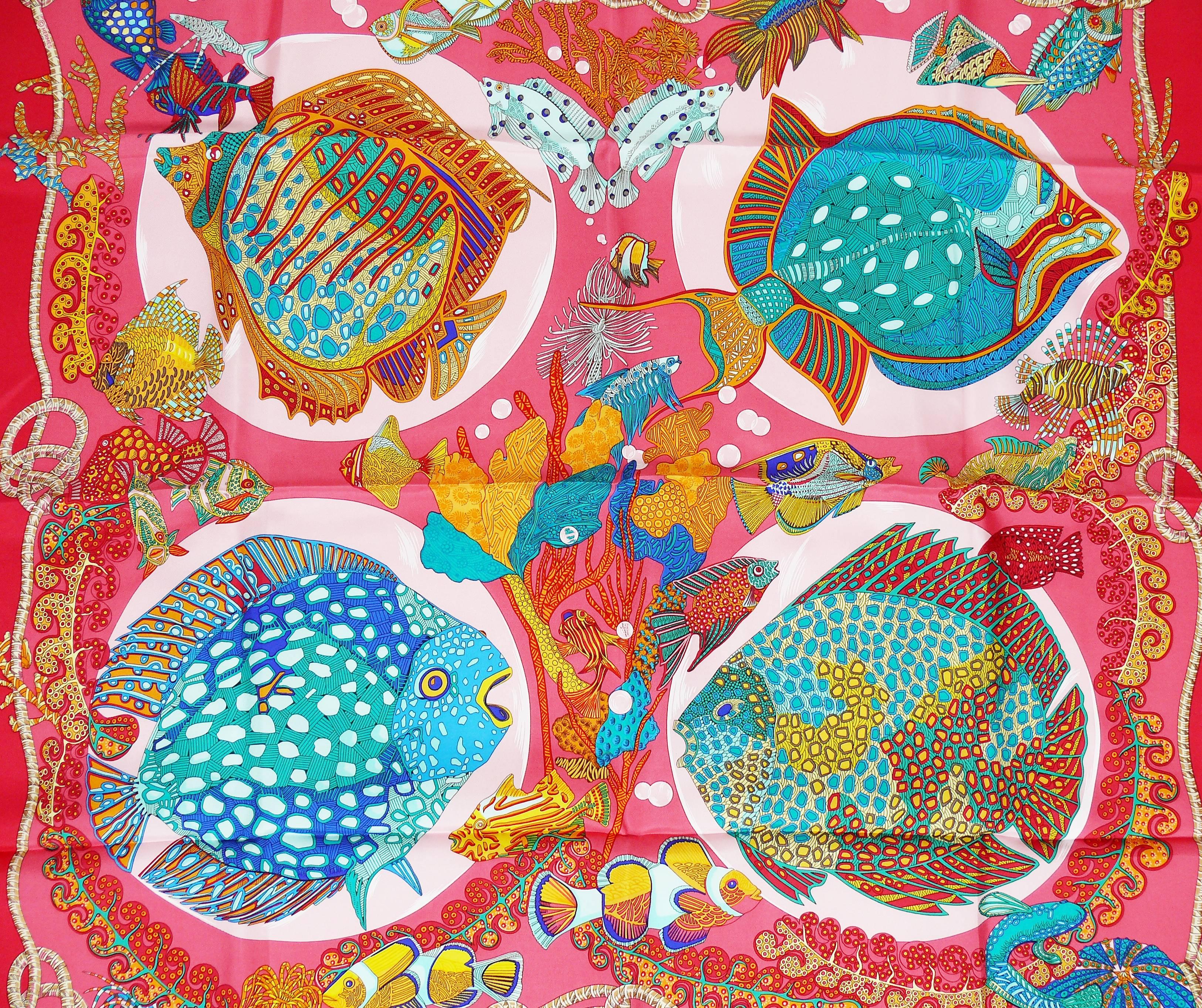 HERMES vintage 1992 hard to find silk carre scarf "Grands Fonds" featuring a gorgeous opulent and vibrant sea-life design.

Designed by ANNIE FAIVRE.

This scarf features :
- Hand rolled borders.
- Plump hems.
- 100 % silk.
- Crispy