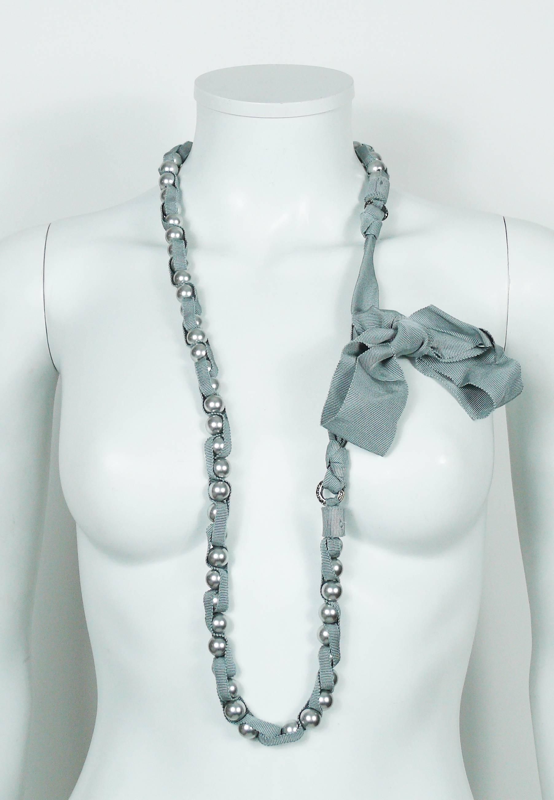 LANVIN grey pearl and grosgrain ribbon long sautoir necklace.

Tie closure

Marked  LANVIN Paris Made in France.

Indicative measurements : total max. length approx. 170 cm (66.93 inches).

JEWELRY CONDITION CHART
- New or never worn : item is in