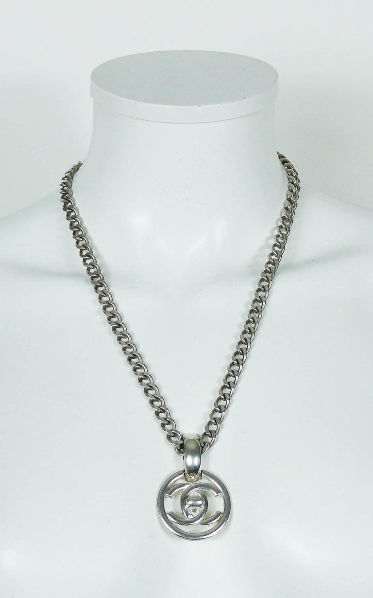 Chanel Vintage 1997 Silver Toned TurnLock Pendant Necklace at 1stDibs