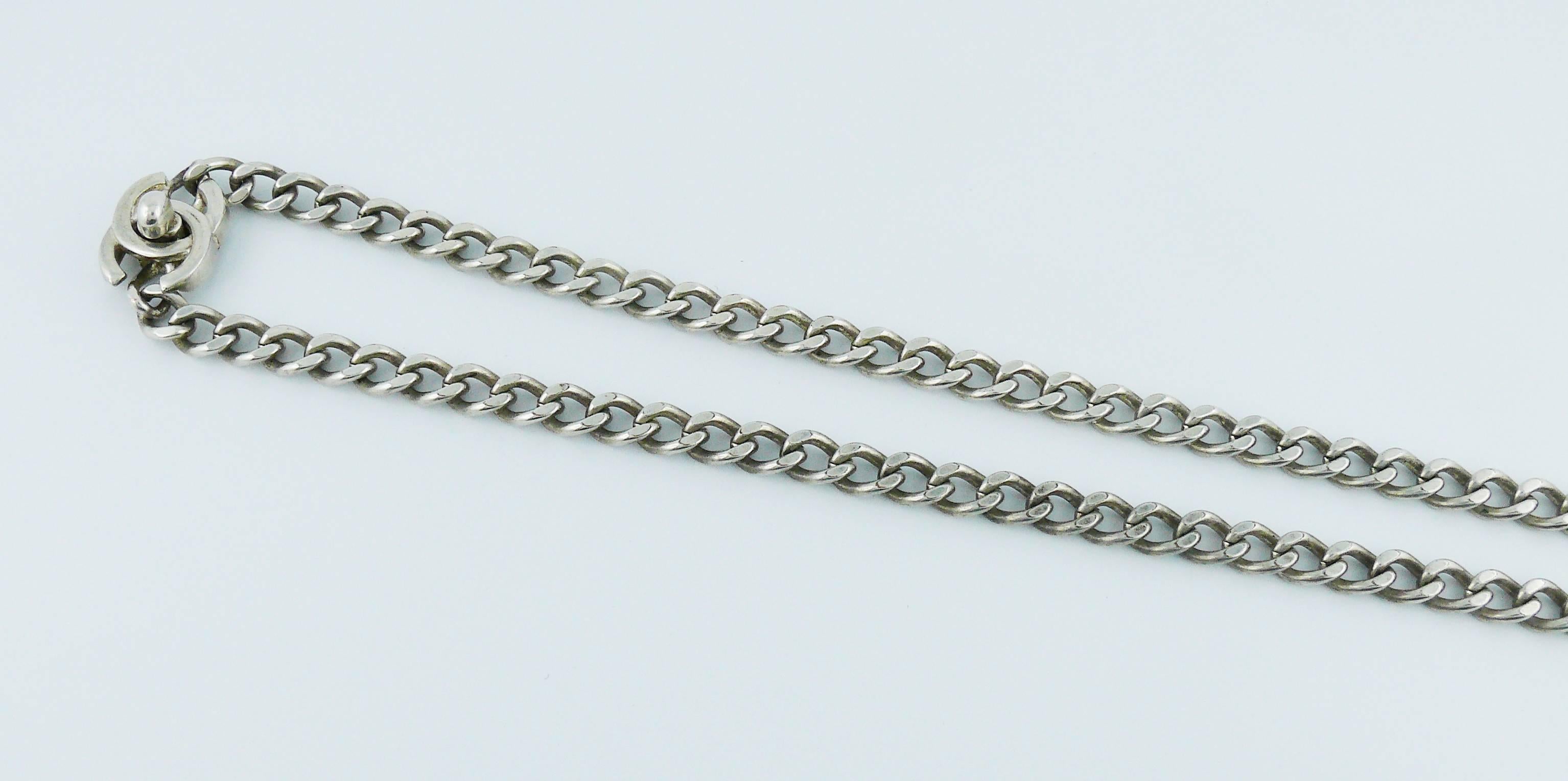 Chanel Vintage 1997 Silver Toned Turn-Lock Pendant Necklace at 1stDibs
