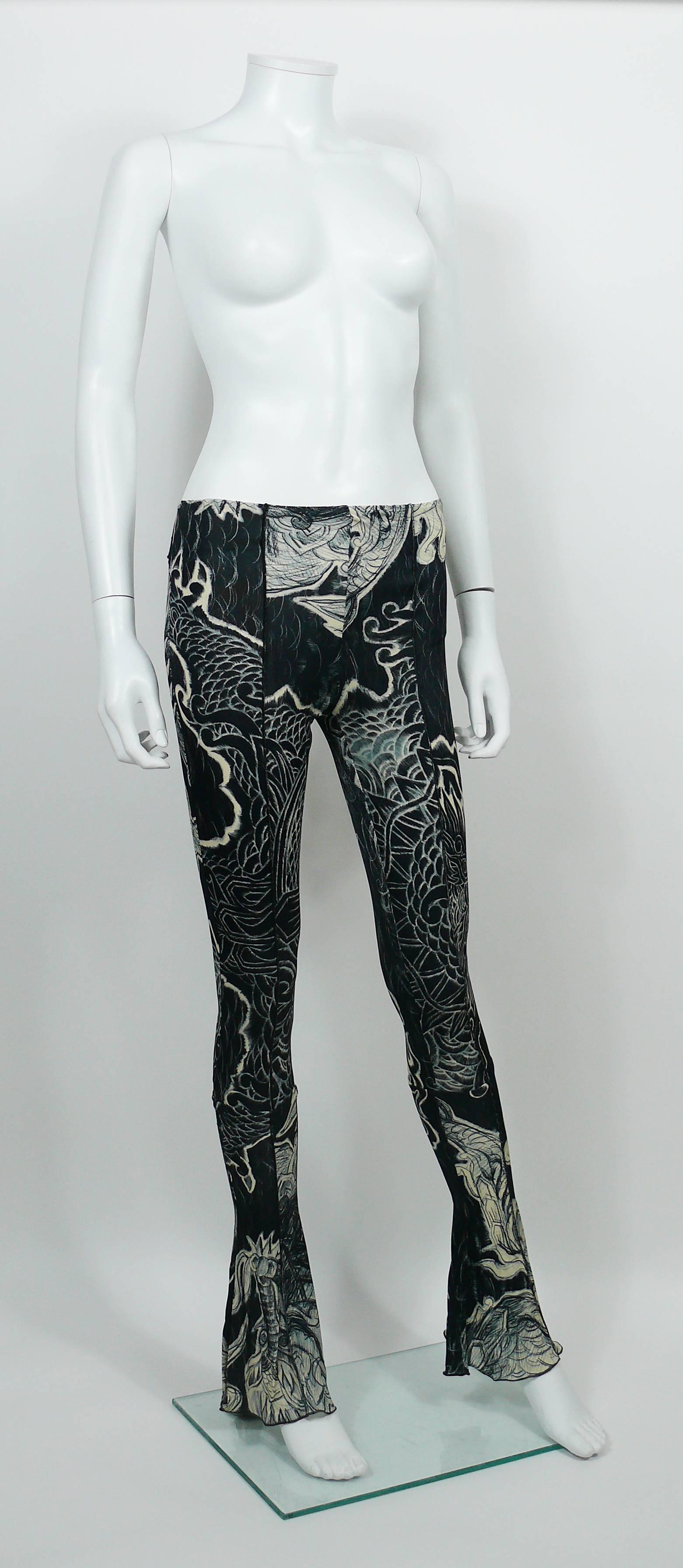 JEAN PAUL GAULTIER stretchy leggings featuring a black and white Japanese inspired tattoo print.

Label reads JEAN PAUL GAULTIER Femme Made in Italy.

Size tag reads : I 40 / D 36 / F 36 / GB 8 / USA 6.
Please refer to measurements.

Composition