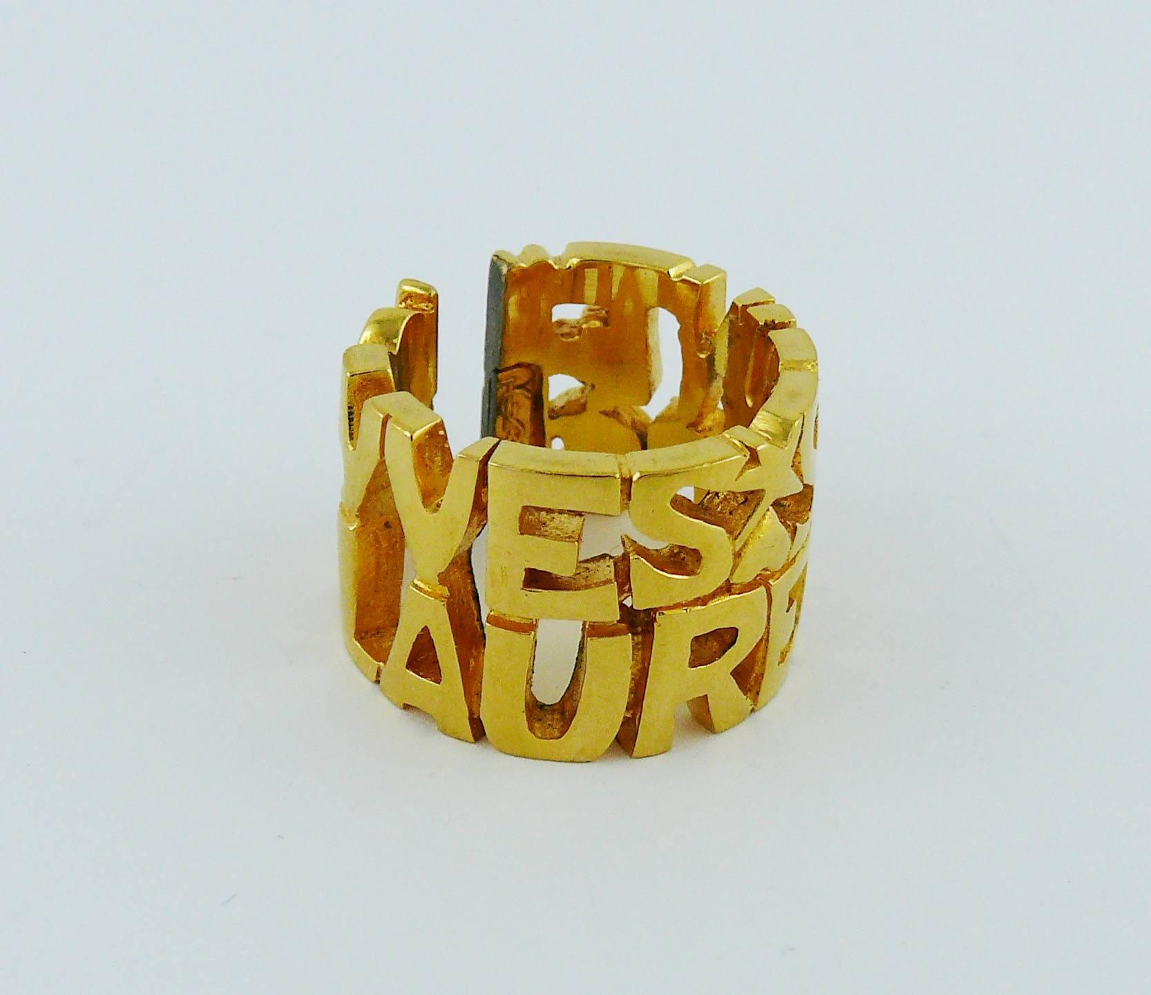 YVES SAINT LAURENT vintage gold toned ring featuring 