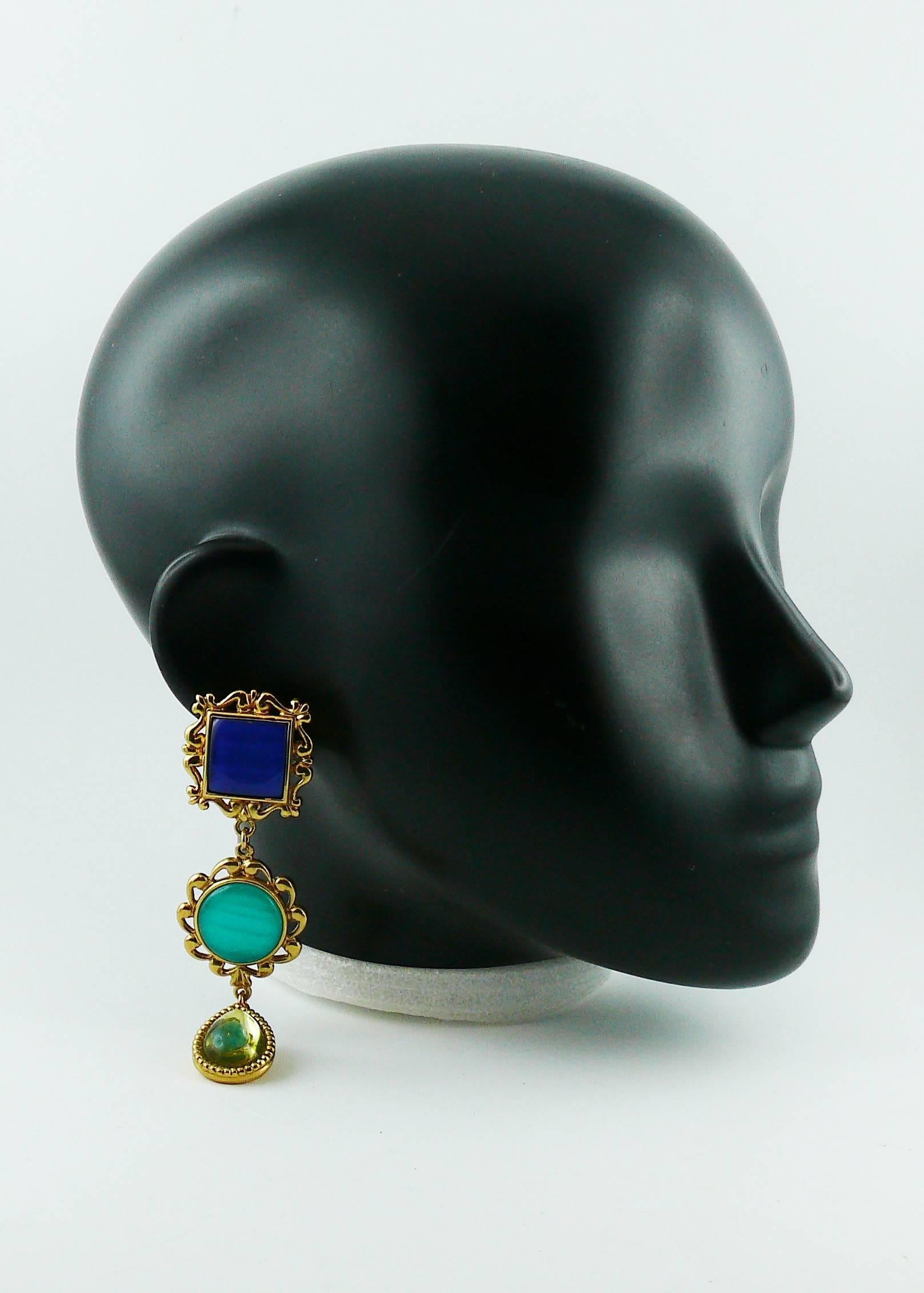 YVES SAINT LAURENT vintage gold toned dangling earrings (clip-on) featuring multicolored gometric elements (square in blue, circle in turquoise and pear in light olive).

Marked YVES SAINT LAURENT Made in France.

Indicative measurements : height