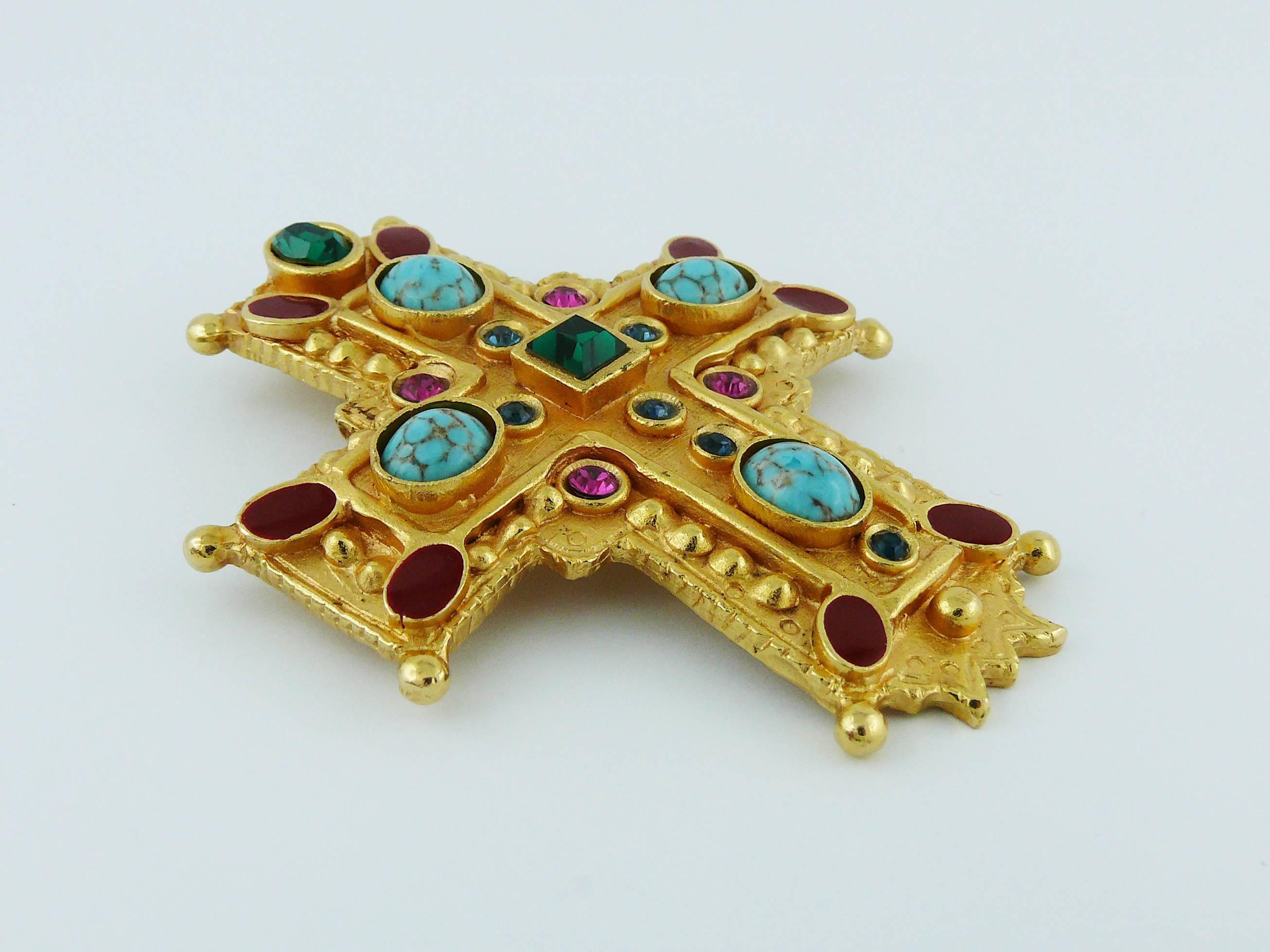 CHRISTIAN LACROIX vintage rare massive jewelled Medieval inspired iconic gold toned cross brooch pendant.

Detailed gold tone metal embellished with multicolored crystals, faux turquoise stones and red enamel.

Can be worn as a brooch or a