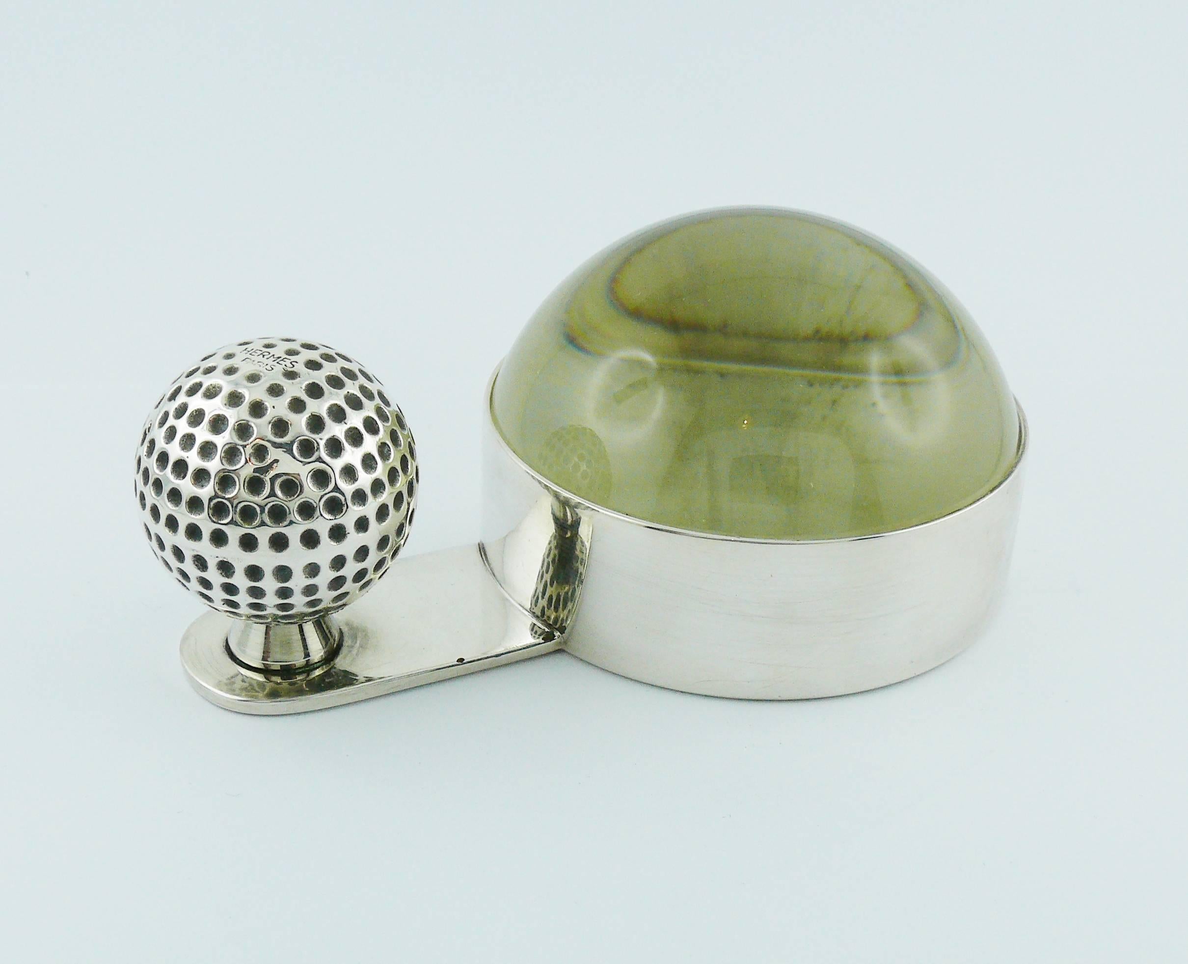 HERMES Paris rare vintage silver plated desk paperweight magnifier featuring a golf ball.

Embossed HERMES Paris Made in France.
Maker's hallmark.

IMPORTANT INFORMATION : Please note that the glass insert is removable (shown on photo