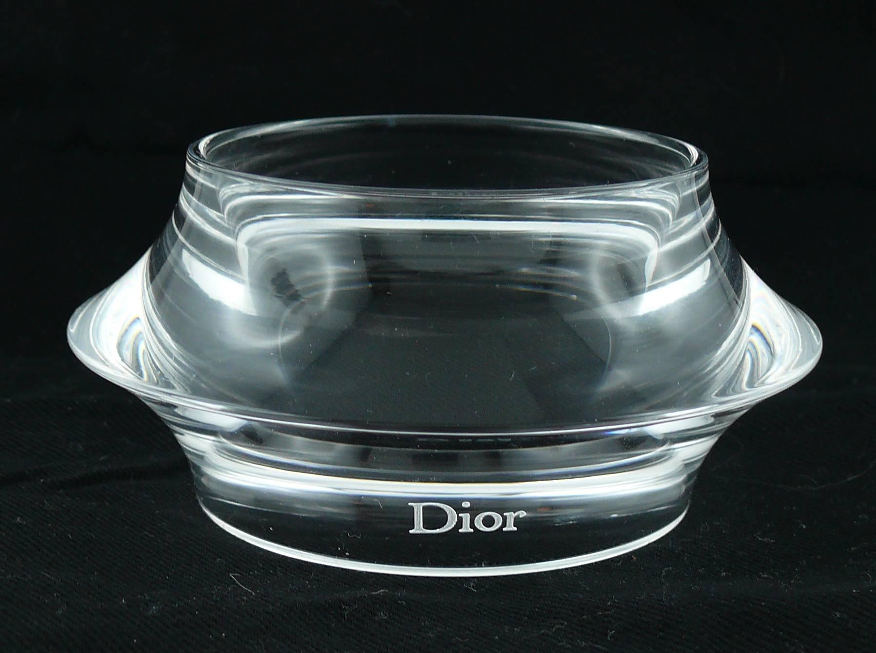 CHRISTIAN DIOR clear lucite cuff and bangle bracelets set.

Embossed DIOR.

CUFF BRACELET
Indicative measurements : inner circumference approx. 20.42 cm (8.04 inches) / width approx. 4.9 cm (1.93 inches).

BANGLE BRACELET
Indicative measurements :