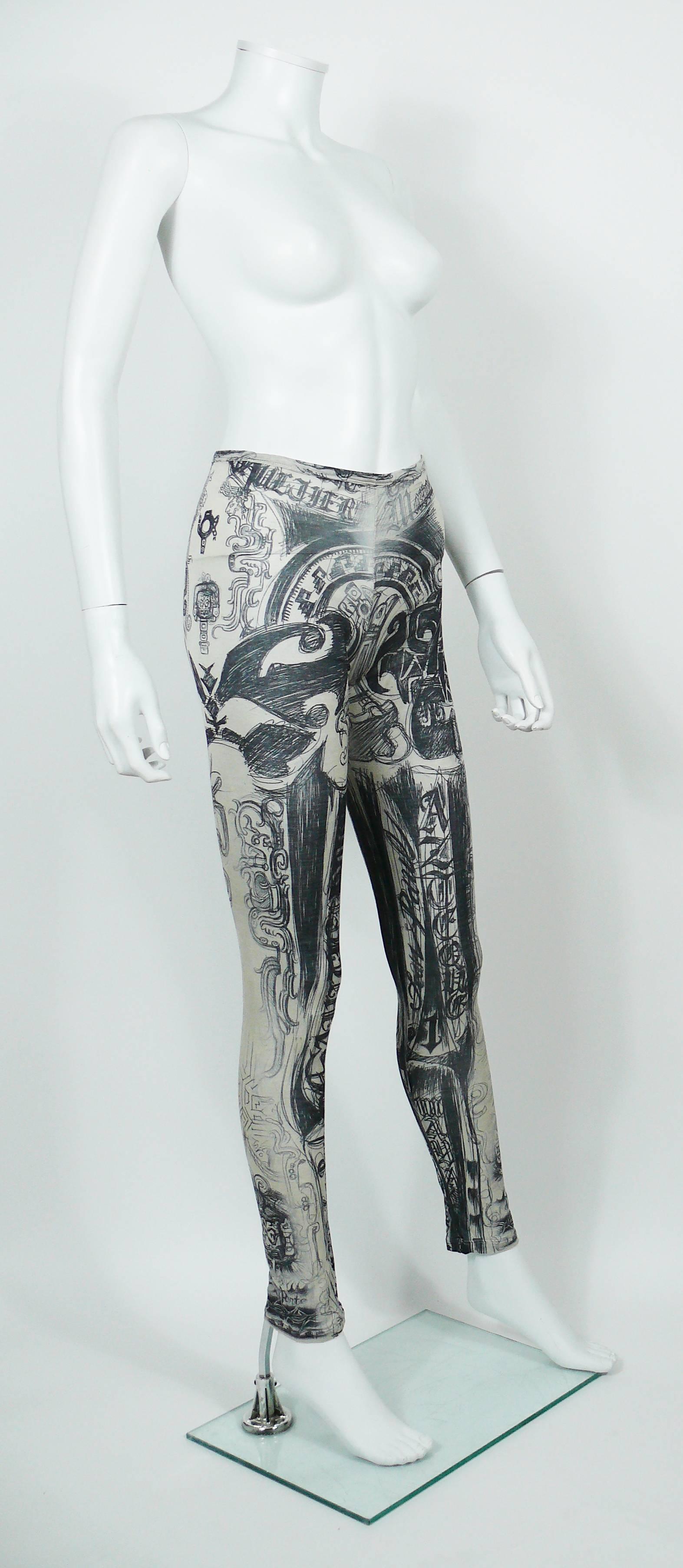 JEAN PAUL GAULTIER stretchy leggings featuring a black and white Mayas tattoo print.

Label reads JEAN PAUL GAULTIER Maille Femme Made in Italy.

Size tag reads : L.
Please refer to measurements.

Composition tage reads : 100 % Silk.

Indicative