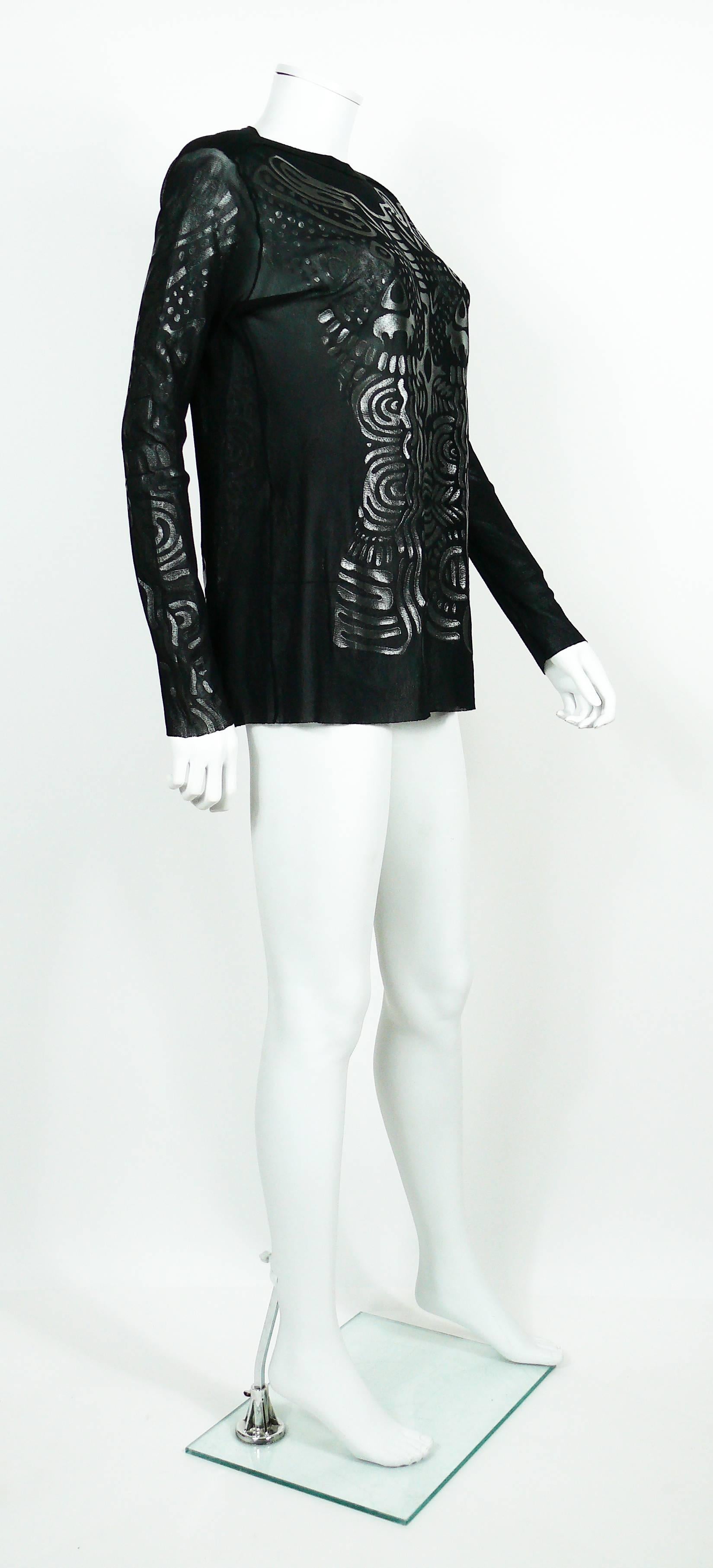 JEAN PAUL GAULTIER Maille vintage black sheer mesh top featuring gorgeous flocked tattoo details on front, back and sleeves.

Label reads JEAN PAUL GAULTIER Maille Made in Italy.

Composition tag reads : 100% Nylon.

Size tag reads L.

Indicative