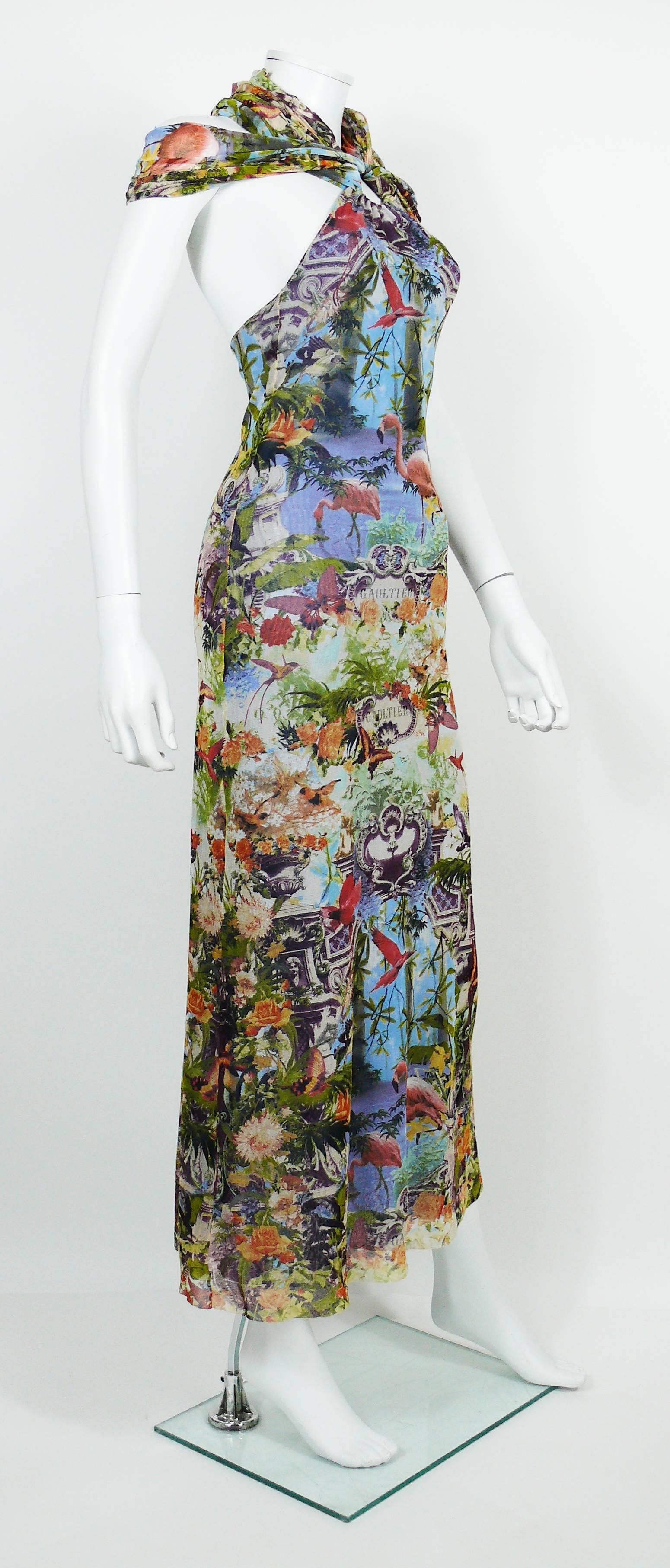 JEAN PAUL GAULTIER vintage tropical print sheer FUZZI mesh dress.

This dress features :
- Multicolored tropical print with flamingos, butterflies, birds and architectural elements.
- Maxi length.
- Halter ring neckline that can be worn in different