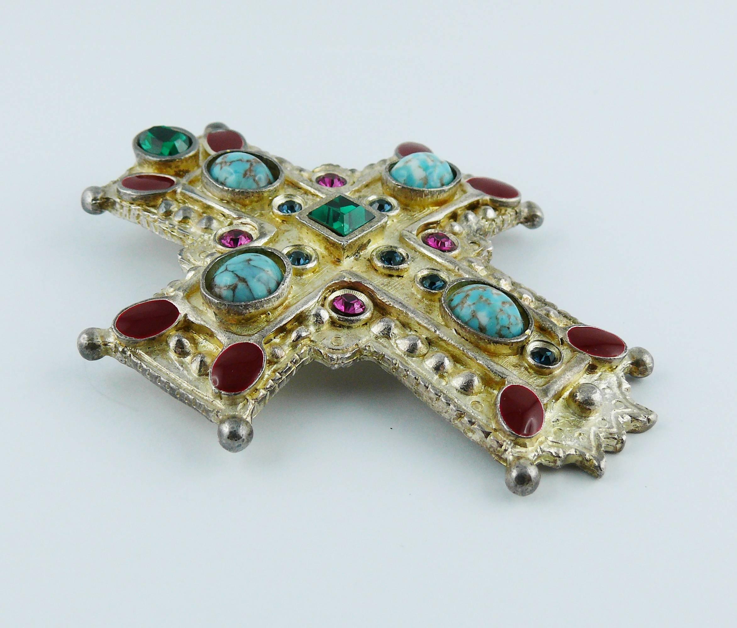 CHRISTIAN LACROIX vintage rare massive jewelled Medieval inspired iconic cross brooch pendant.

Detailed antiqued silver tone metal embellished with multicolored crystals, faux turquoise stones and red enamel.

Can be worn as a brooch or a