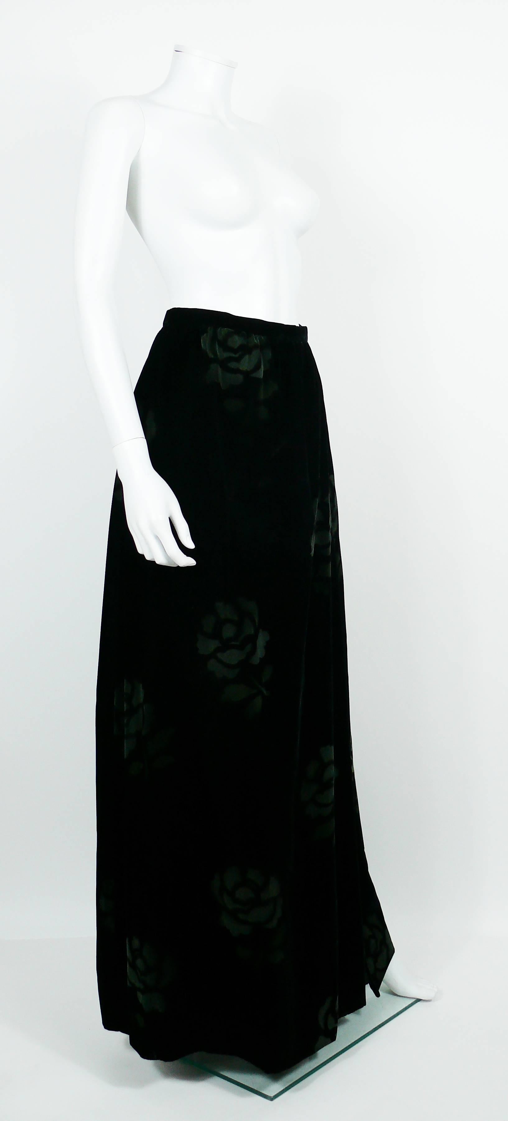 JEAN LOUIS SCHERRER Boutique vintage black velvet maxi length wrap skirt featuring large flowers design.

Back zip closure.
Fully lined.
Side pockets.

Label reads JEAN LOUIS SCHERRER Boutique Paris.
Made in France.
Numbered A51111.

Size label
