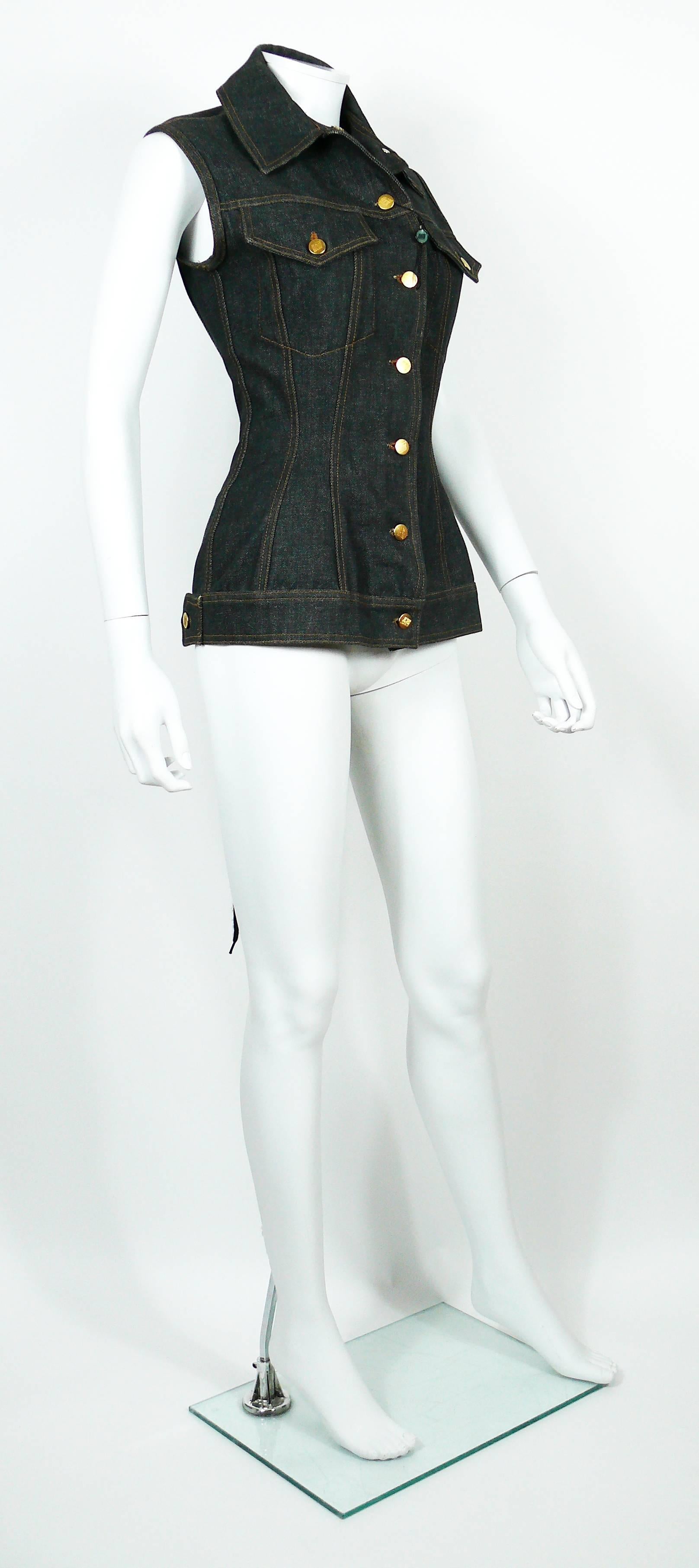 JEAN PAUL GAULTIER vintage distressed black denim corset style sleeveless jacket.

This jacket features :
- Beautiful iconic back lace up detail.
- Classic collar.
- Front button fastening.
- Pocket detail at the chest.
- Gold toned signature JUNIOR