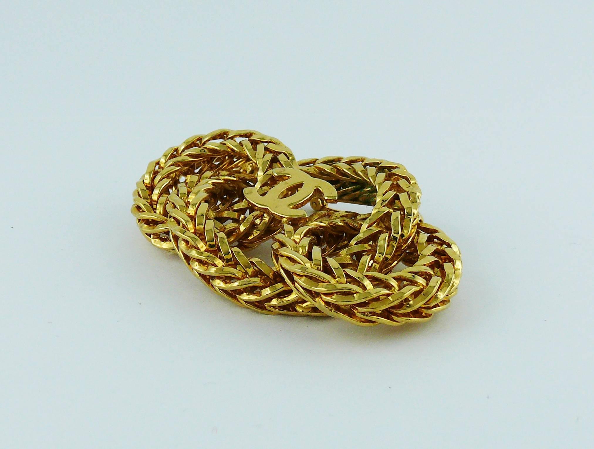 Women's Chanel Vintage 1980s Gold Toned Chain Rings with CC Brooch