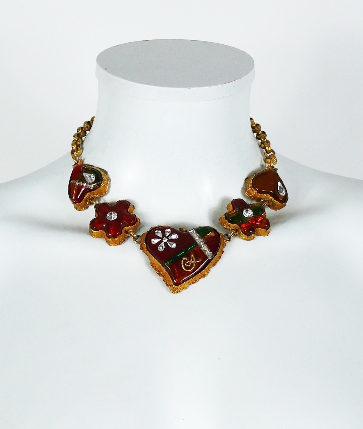 CHRISTIAN LACROIX antiqued gold tone necklace featuring multicolored resin inlaid hearts and flowers with crystal embellishement.

Marked CHRISTIAN LACROIX CL Made in France.

Indicative measurements : max. length approx. 41.5 cm (16.34 inches) /