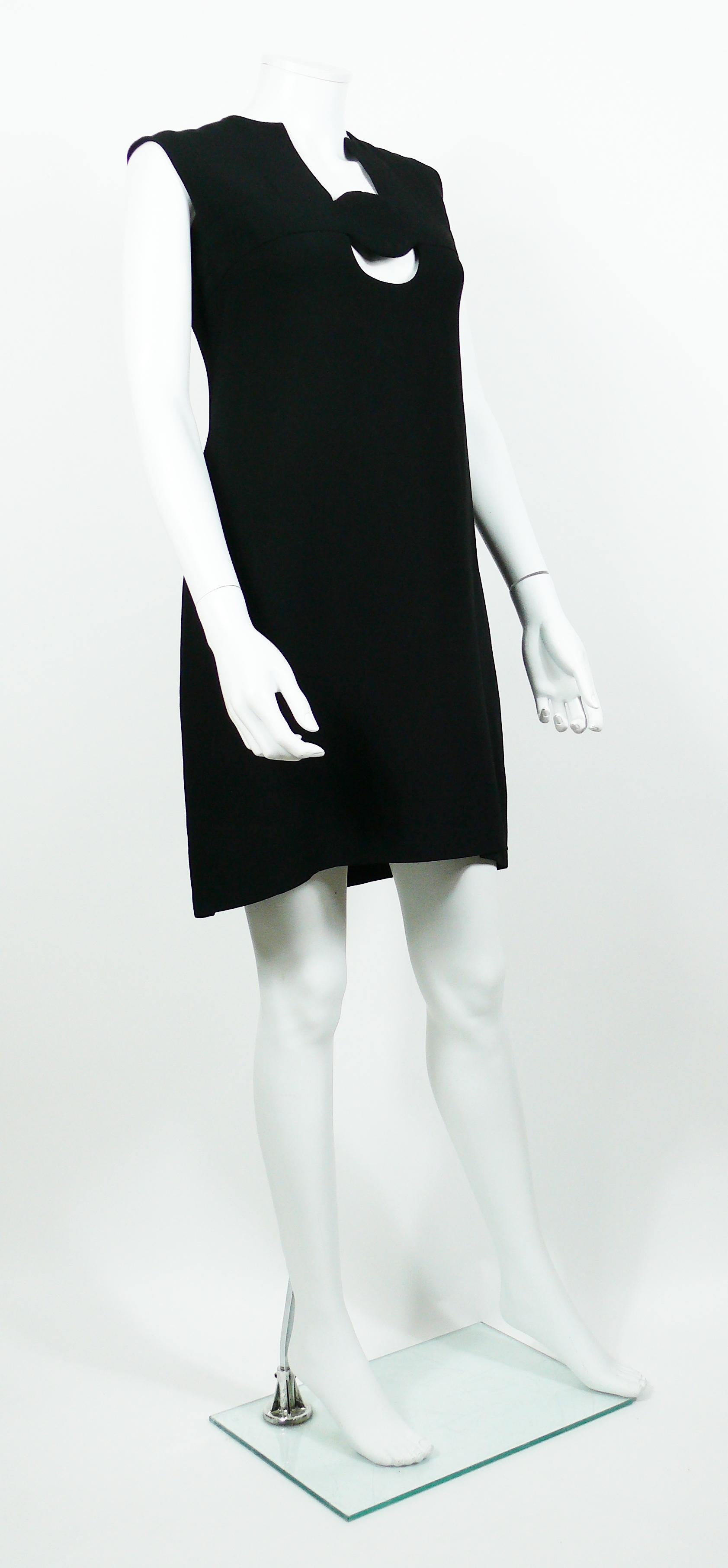 PIERRE CARDIN vintage Spage Age sleeveless dress featuring circle cut out on the chest.

Fully lined.
Back zip closure.

Label reads PIERRE CARDIN BOUTIQUE Paris.

Missing size tag.
Please double check measurements. 

Missing composition