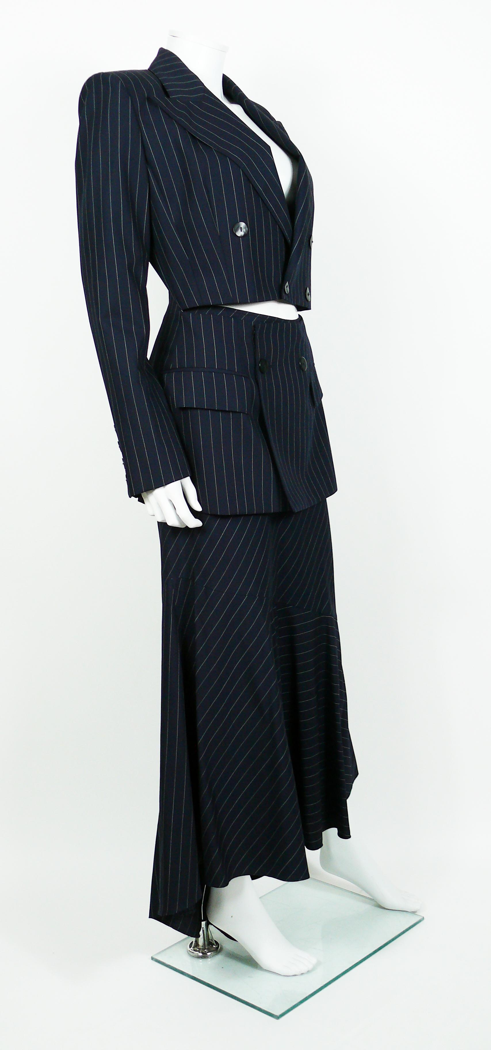 JEAN PAUL GAULTIER striped navy blue virgin wool maxi skirt suit featuring an iconic cut-out waist blazer jacket.

Label reads JEAN PAUL GAULTIER Femme.
Made in Italy.

BLAZER size tag reads : I 42 / D 38 / F 38 / GB 10 / USA 8.
Indicative