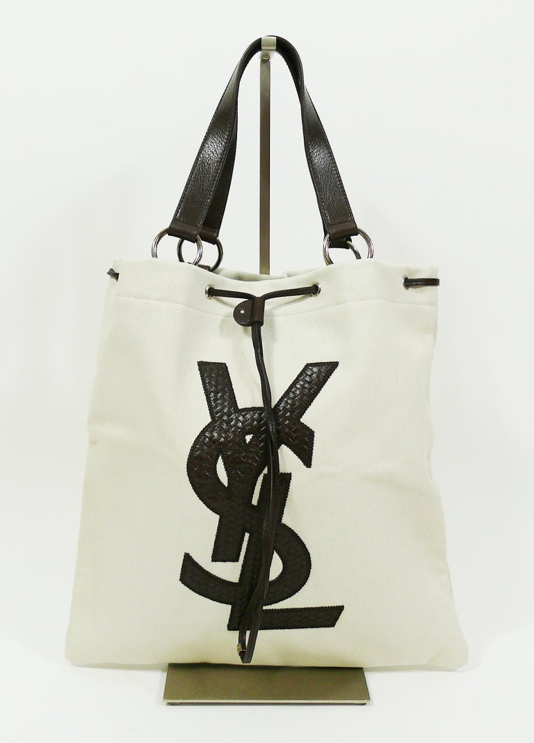 Sold at Auction: A Saint Laurent (YSL) Large Black Rive Gauche Tote Bag.